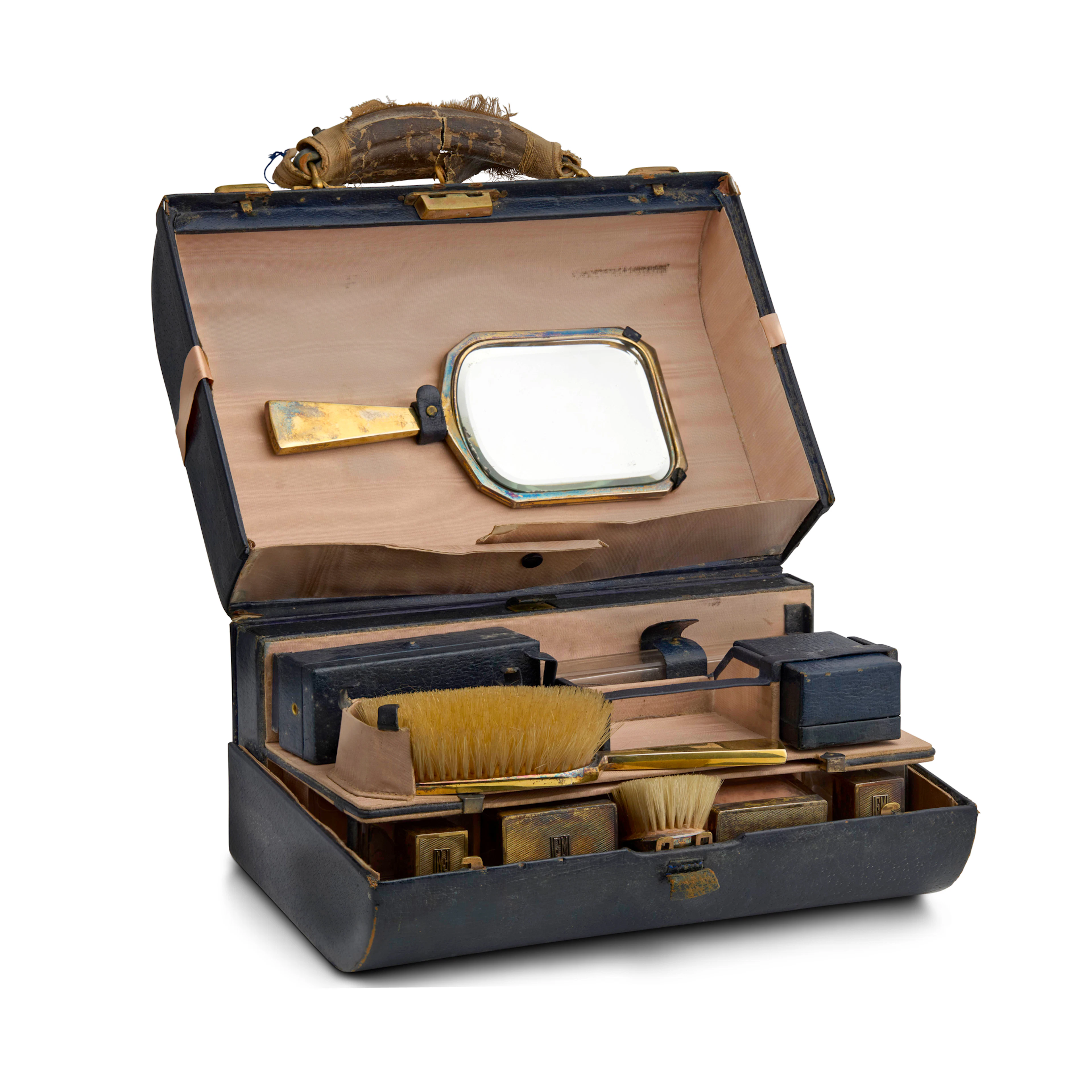 A 1930s SILVER-GILT TRAVELLING VANITY CASE