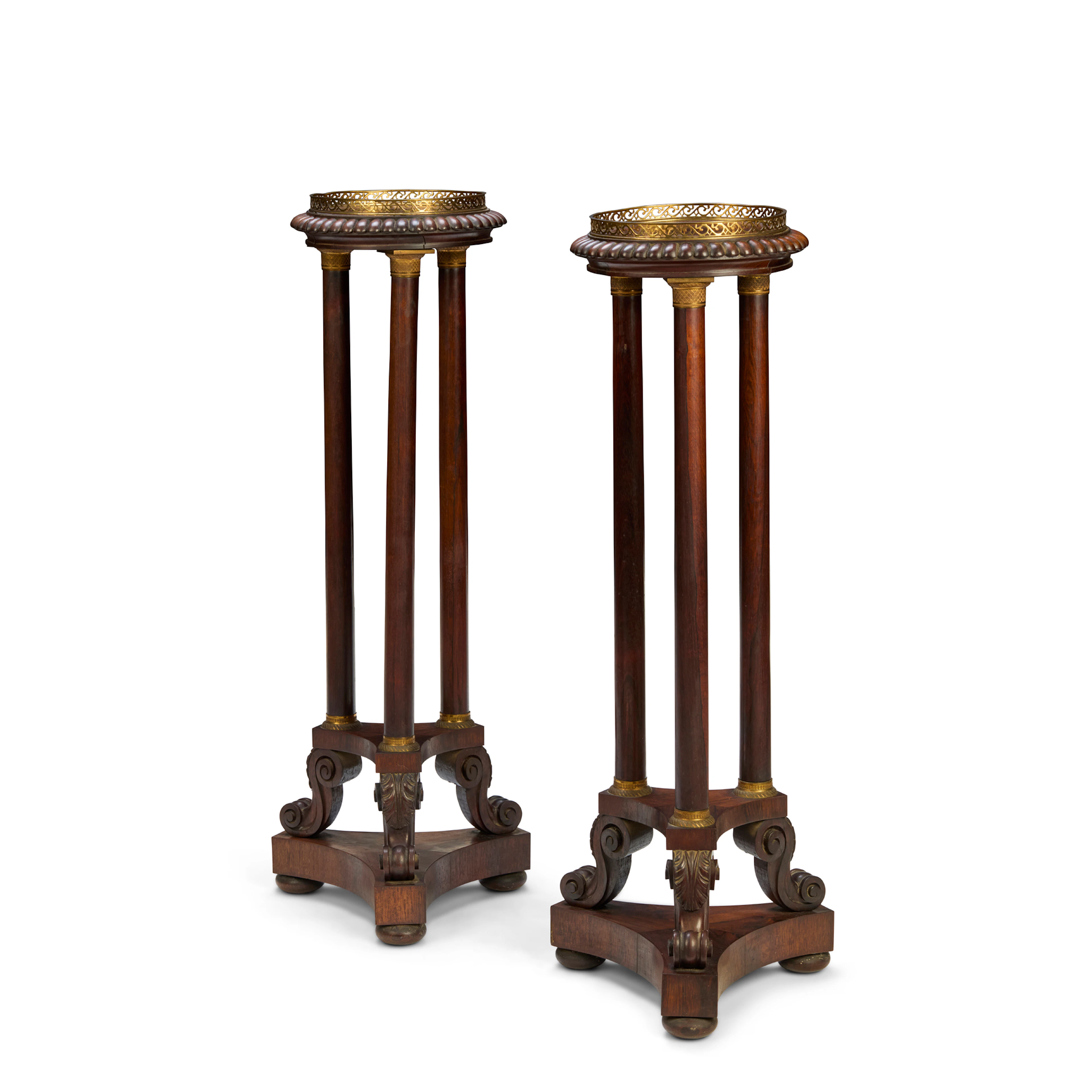 PAIR OF FRENCH EMPIRE STYLE ROSEWOOD AND BRASS MOUNTED TORCHERE STANDS