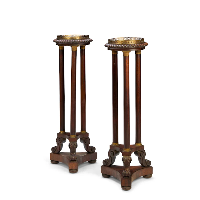 PAIR OF FRENCH EMPIRE STYLE ROSEWOOD AND BRASS MOUNTED TORCHERE STANDS