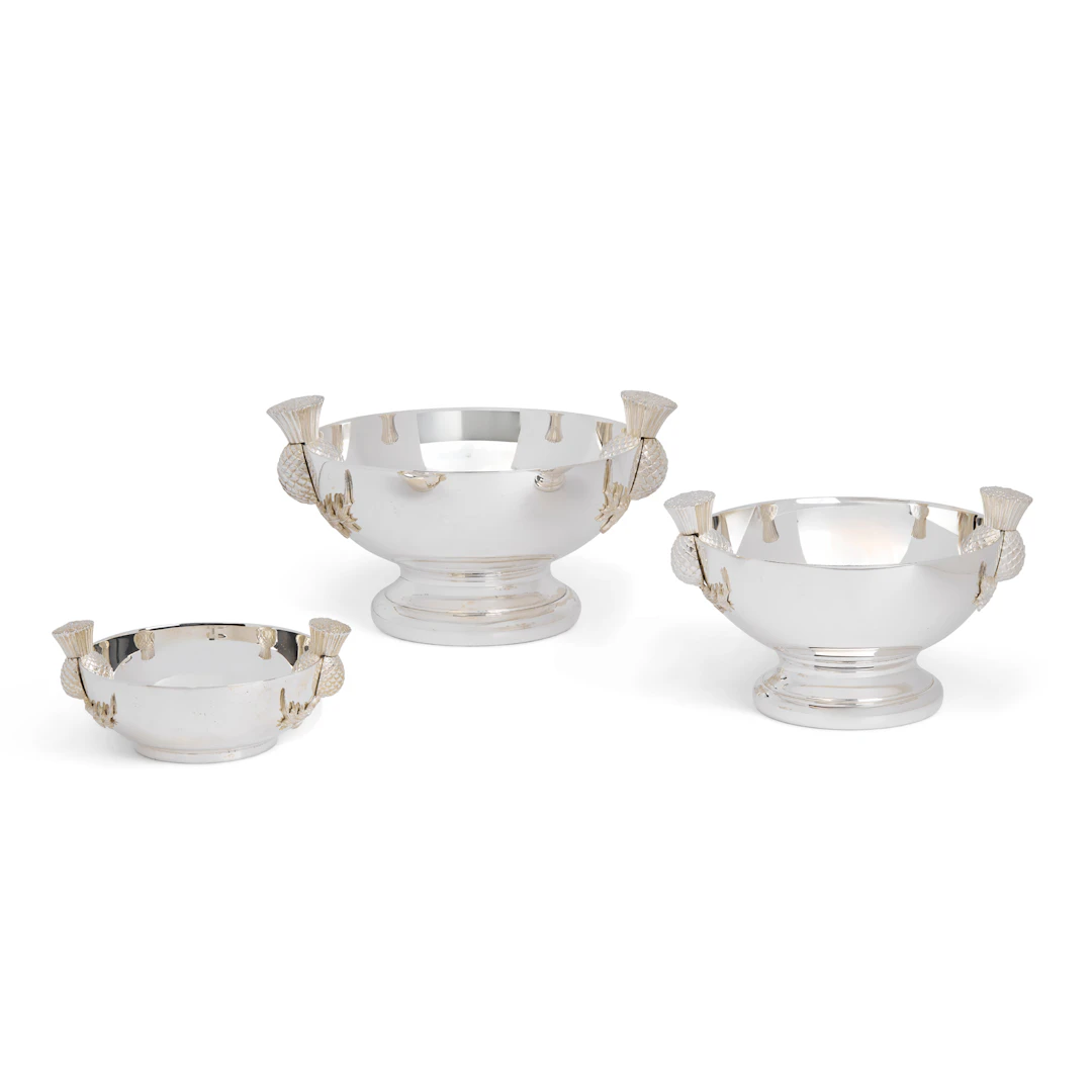 SET OF THREE CONTEMPORARY SILVER GRADUATED THISTLE QUAICHS