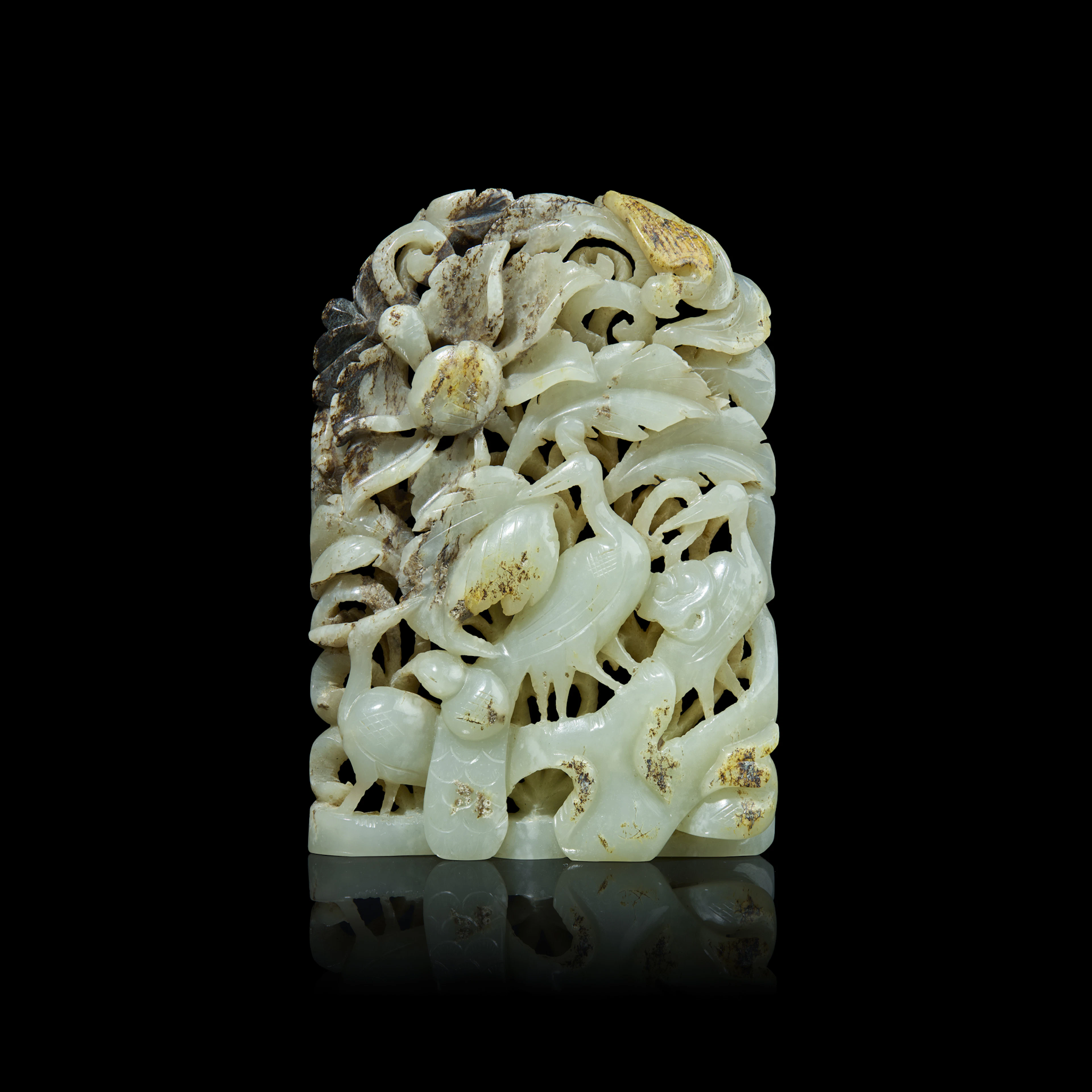 [COLLECTION OF A BRITISH FAMILY] CHINESE RETICULATED WHITE JADE WITH