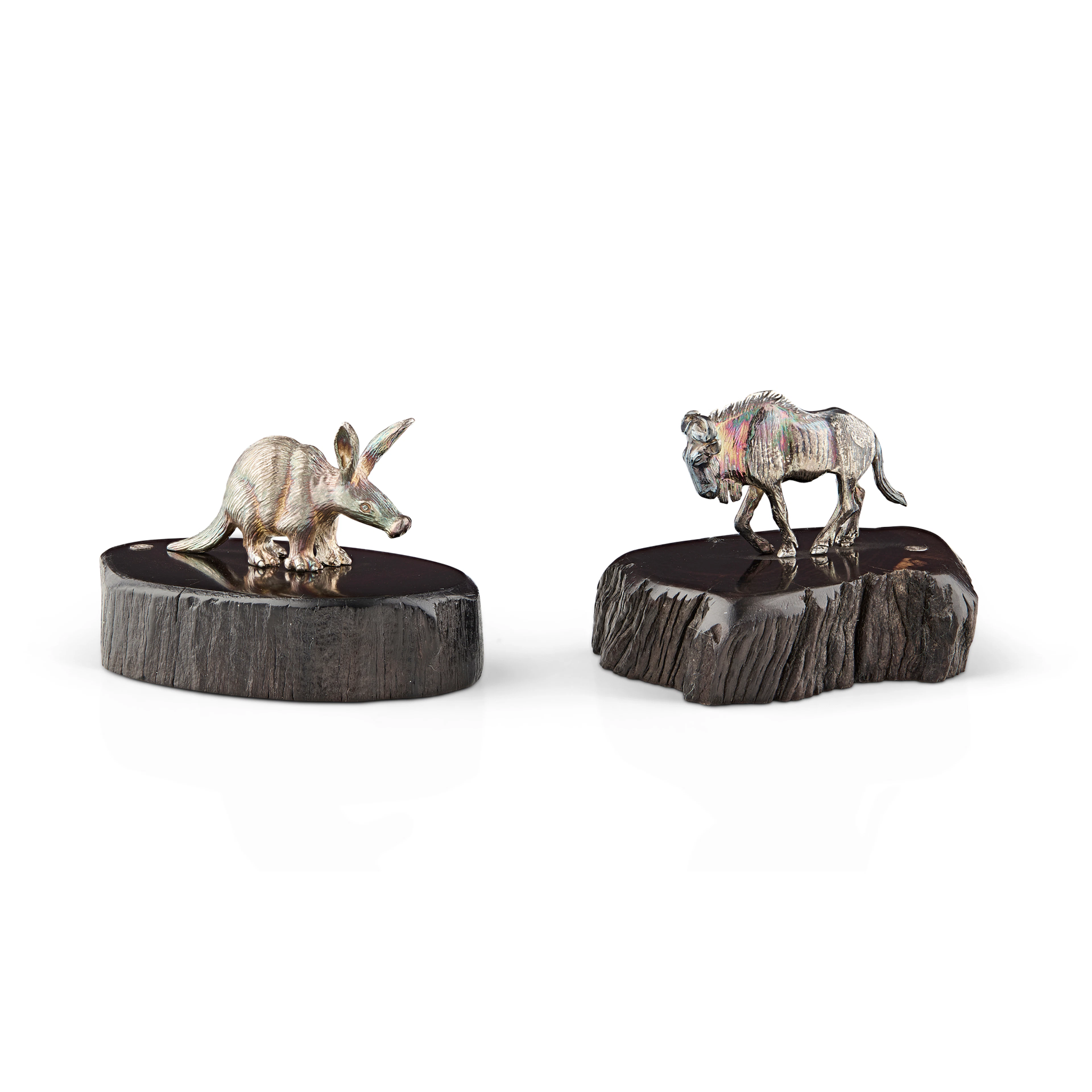 A SET OF TWO CONTEMPORARY WILDEBEEST AND AARDVARK SCULPTURES