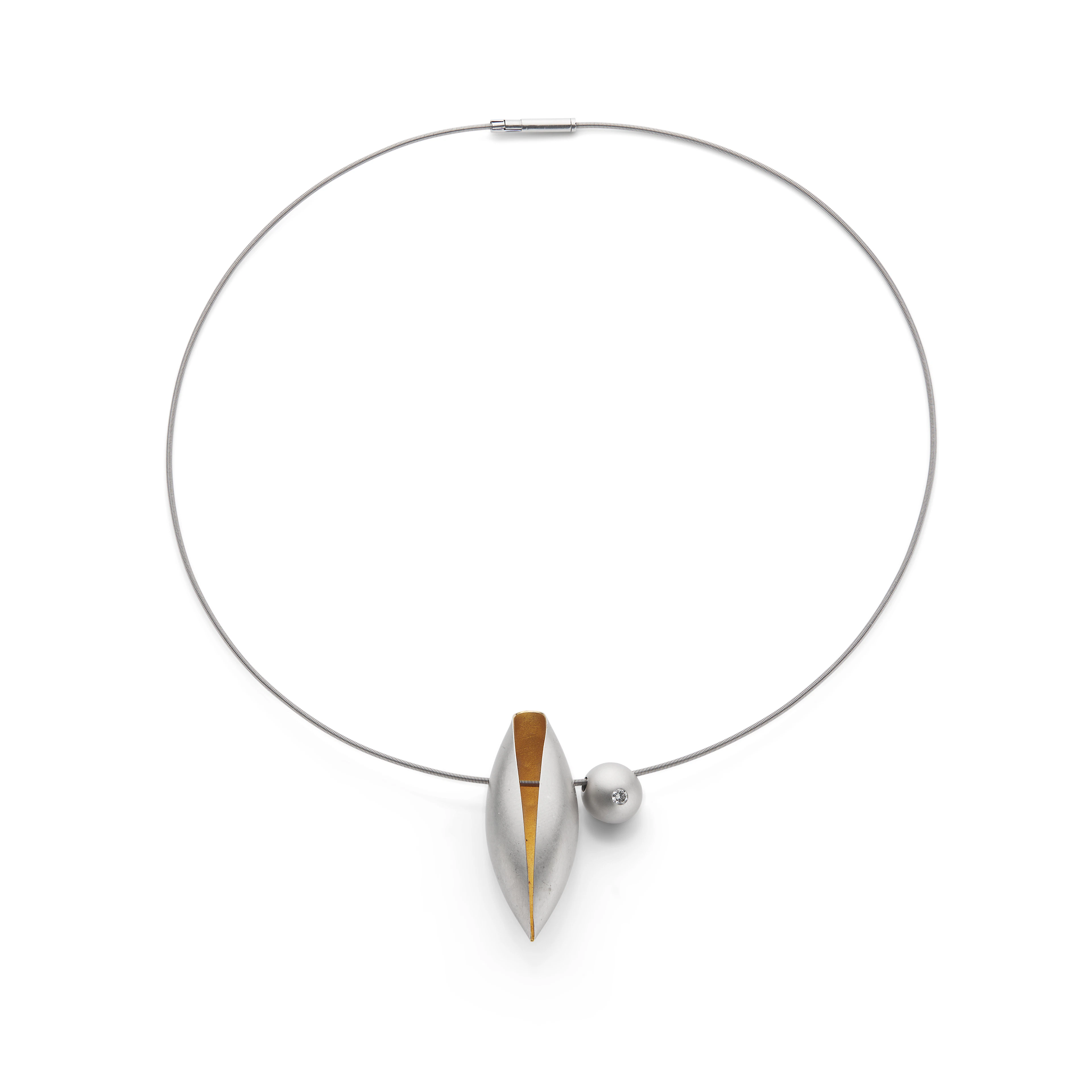 Niessing: A cord necklace with two pendants
