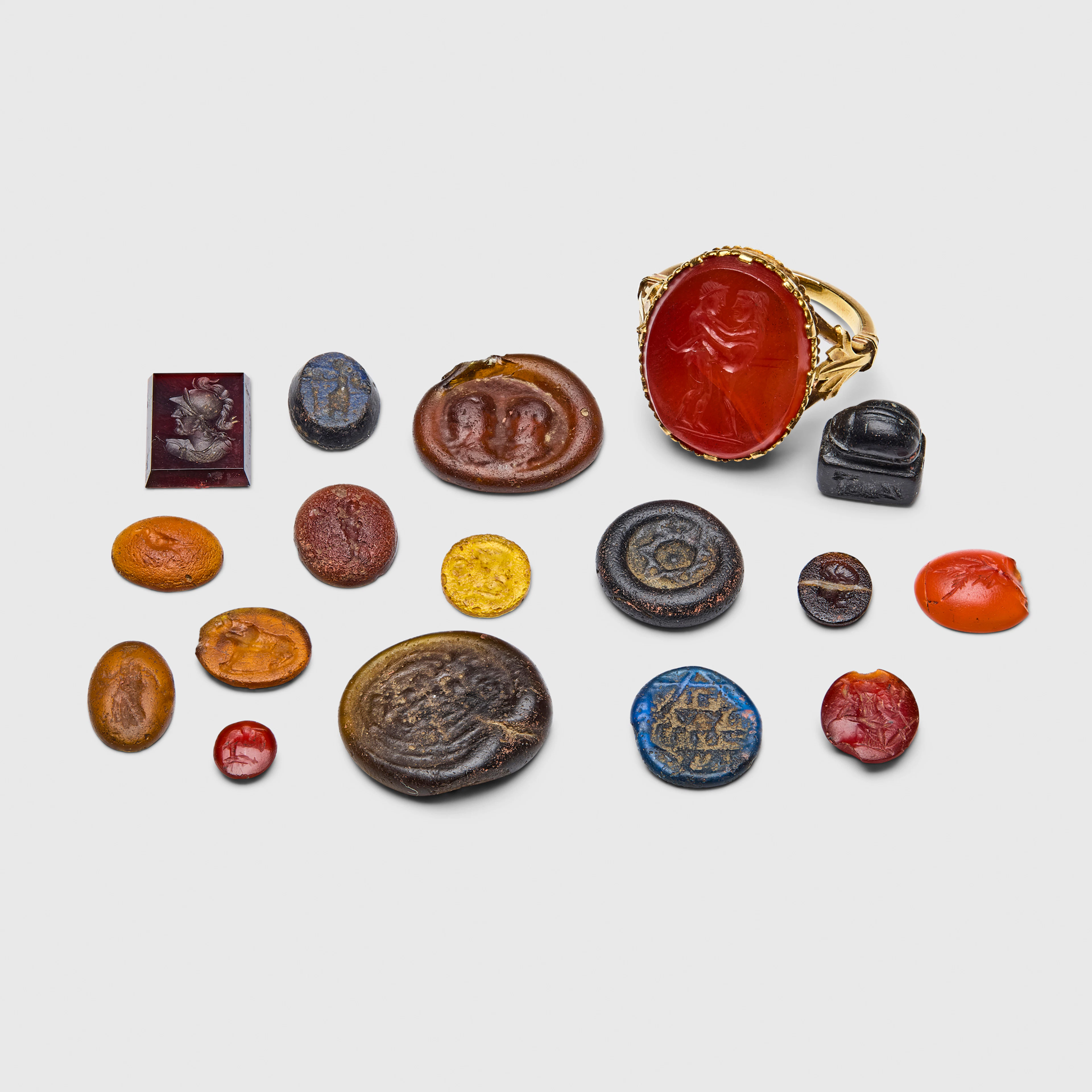LARGE COLLECTION OF ANCIENT (AND LATER) INTAGLIOS & CAMEOS, FORMED