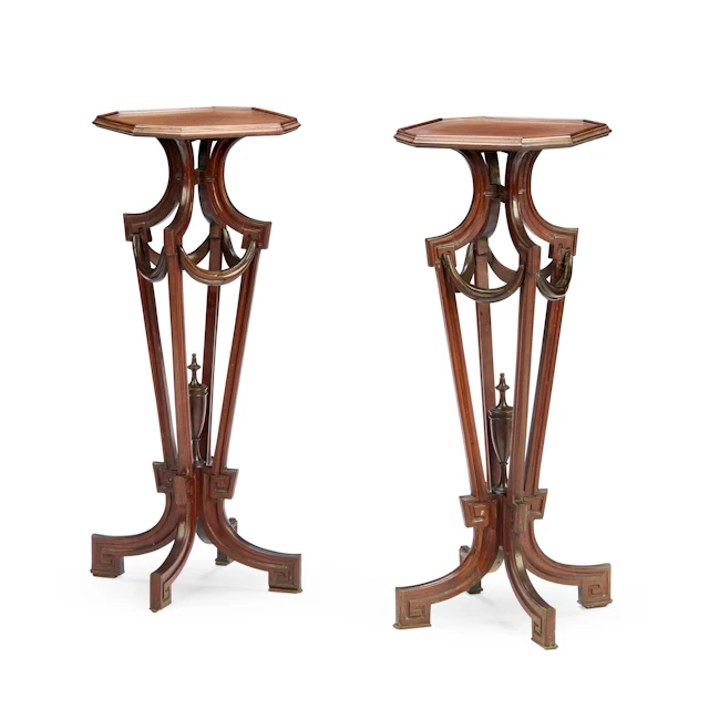 PAIR OF EDWARDIAN MAHOGANY TORCHERE STANDS