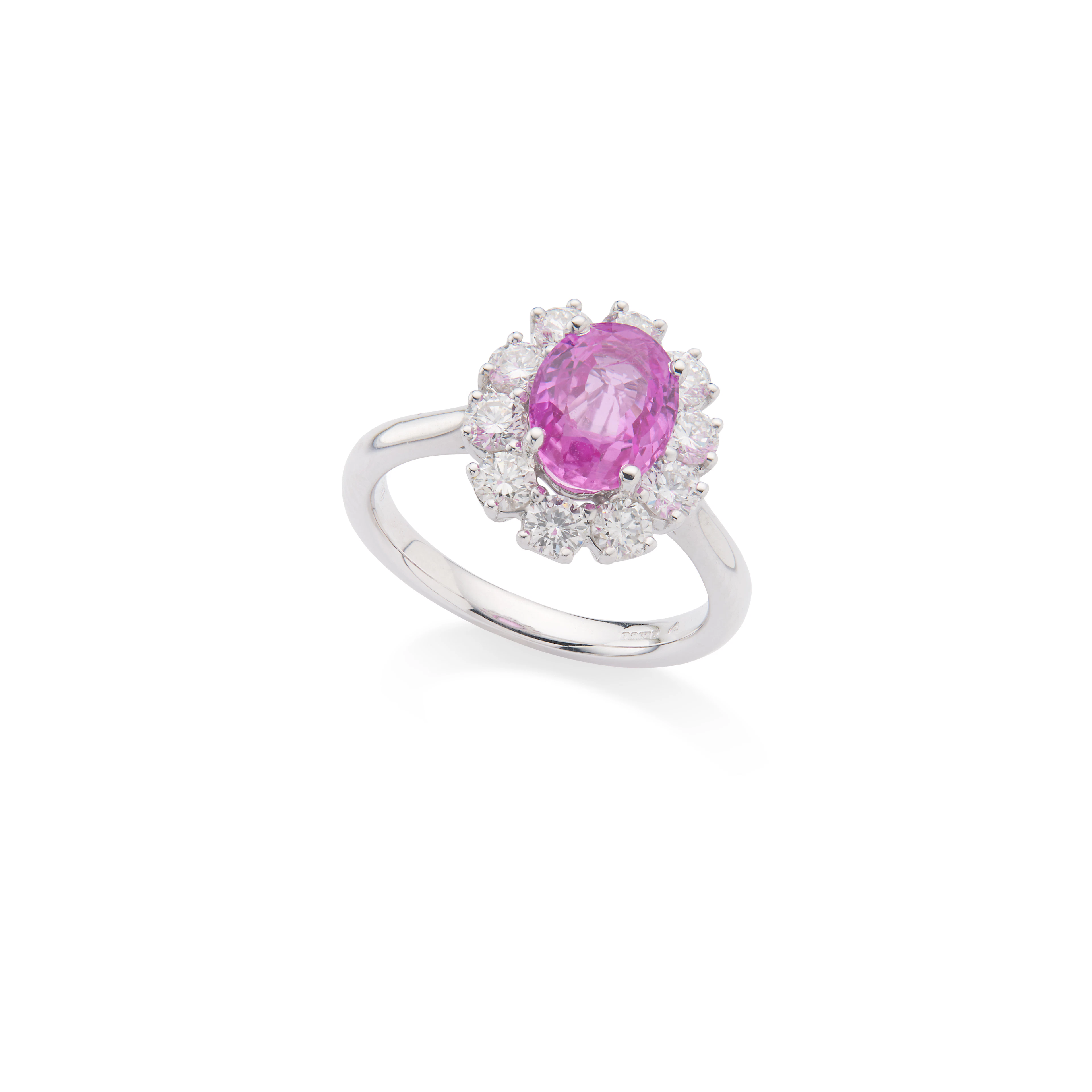 A pink sapphire and diamond cluster ring
