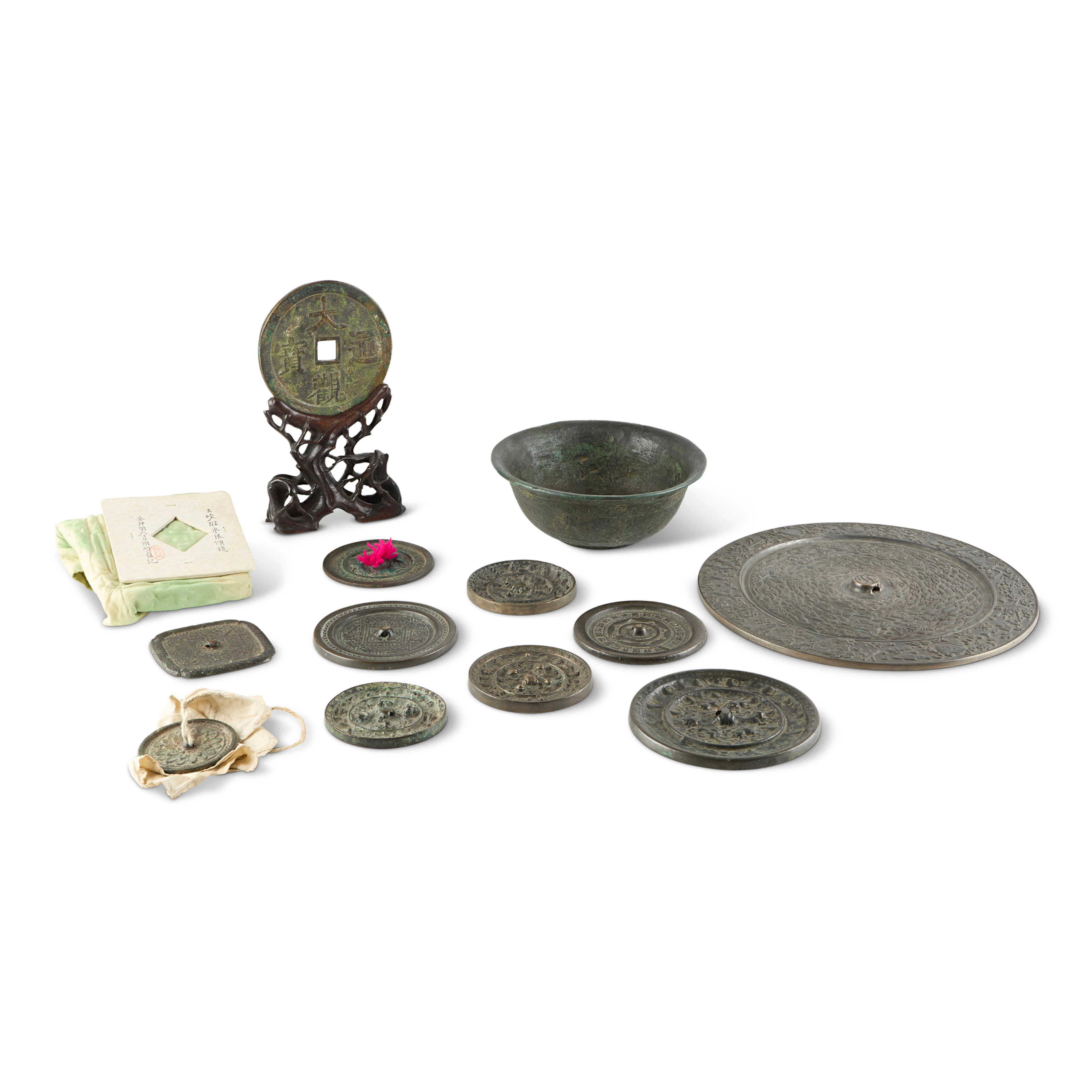 GROUP OF TEN CHINESE BRONZE MIRRORS WITH A COIN AND A BOWL