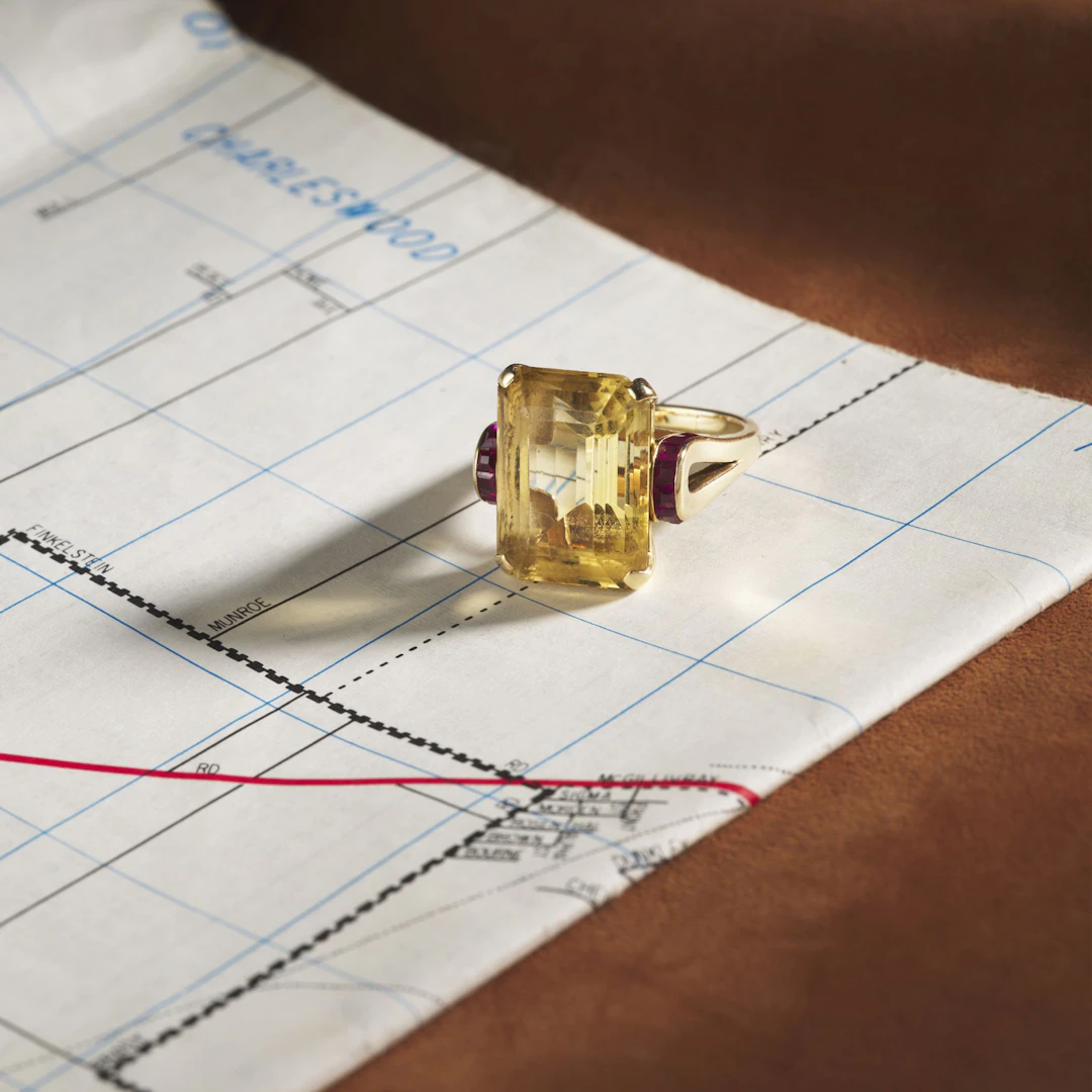 Seaman Schepps: A citrine and ruby cocktail ring, circa 1940
