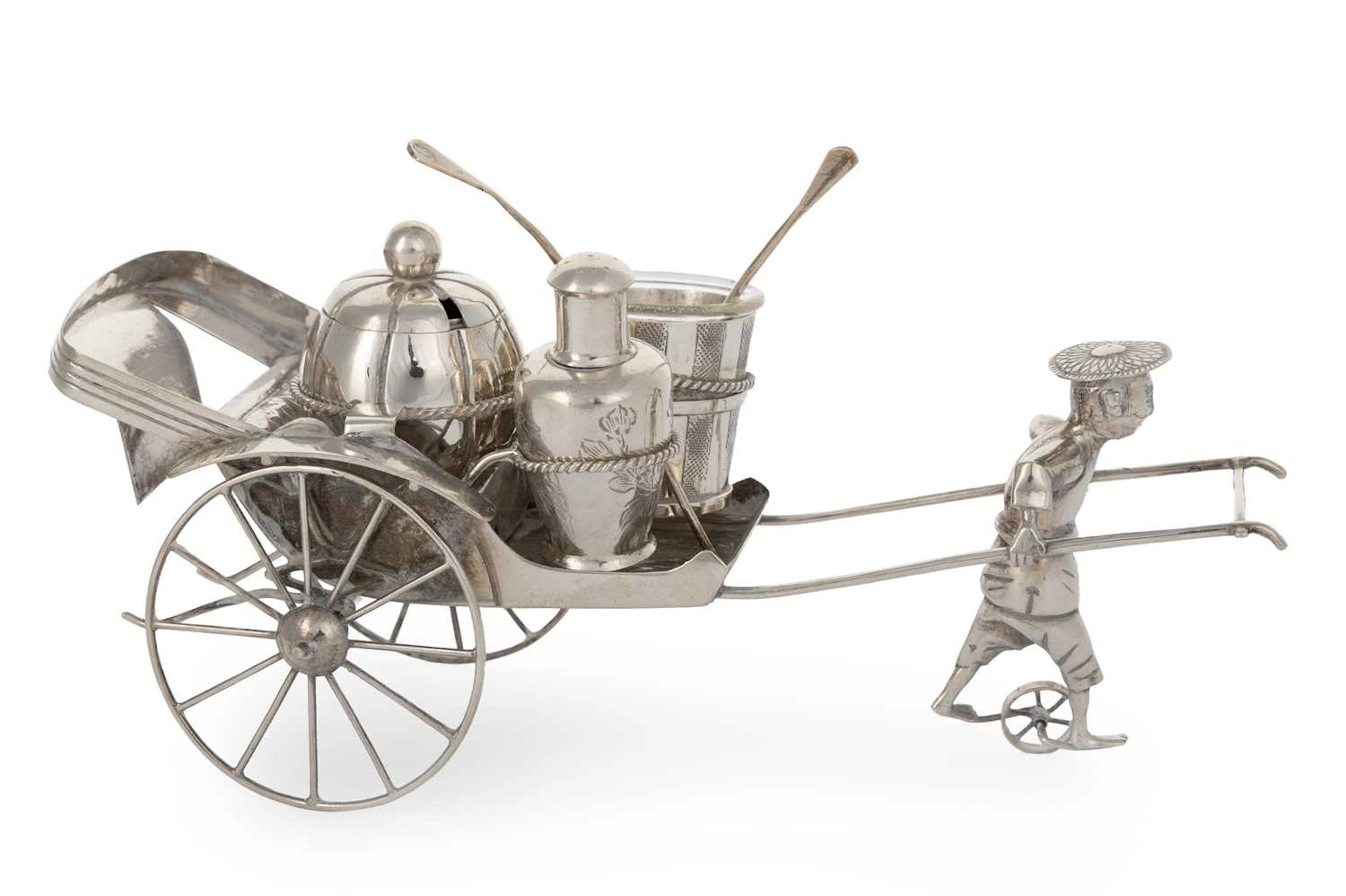 HONG KONG SILVER RICKSHAW CRUET SET EARLY/MID 20TH CENTURY