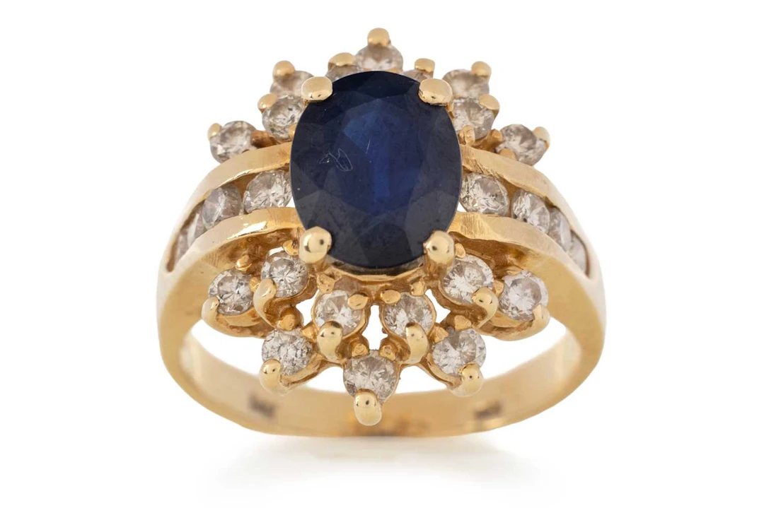 SAPPHIRE AND DIAMOND CLUSTER RING LATE 20TH CENTURY