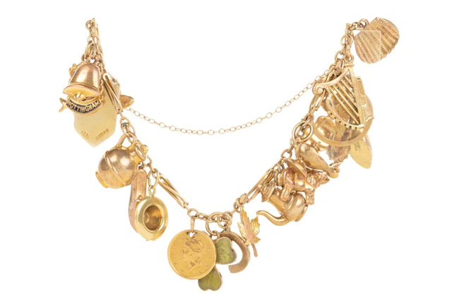 GOLD CHARM BRACELET MID/LATE 20TH CENTURY
