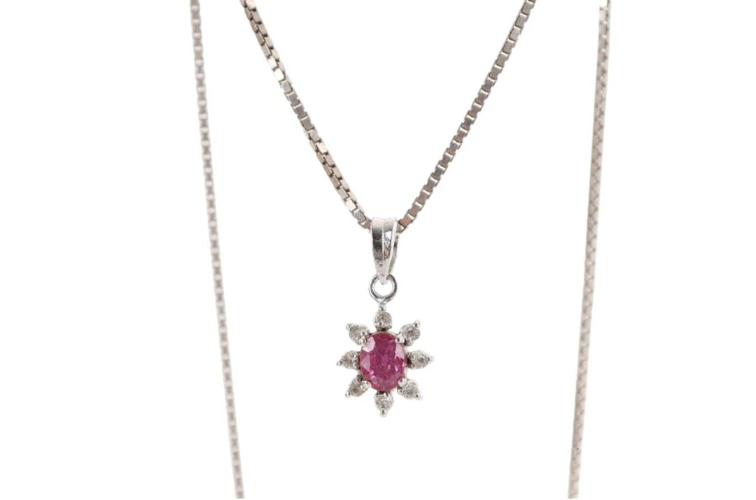 RUBY AND CUBIC ZIRCONIA CLUSTER NECKLACE LATE 20TH CENTURY