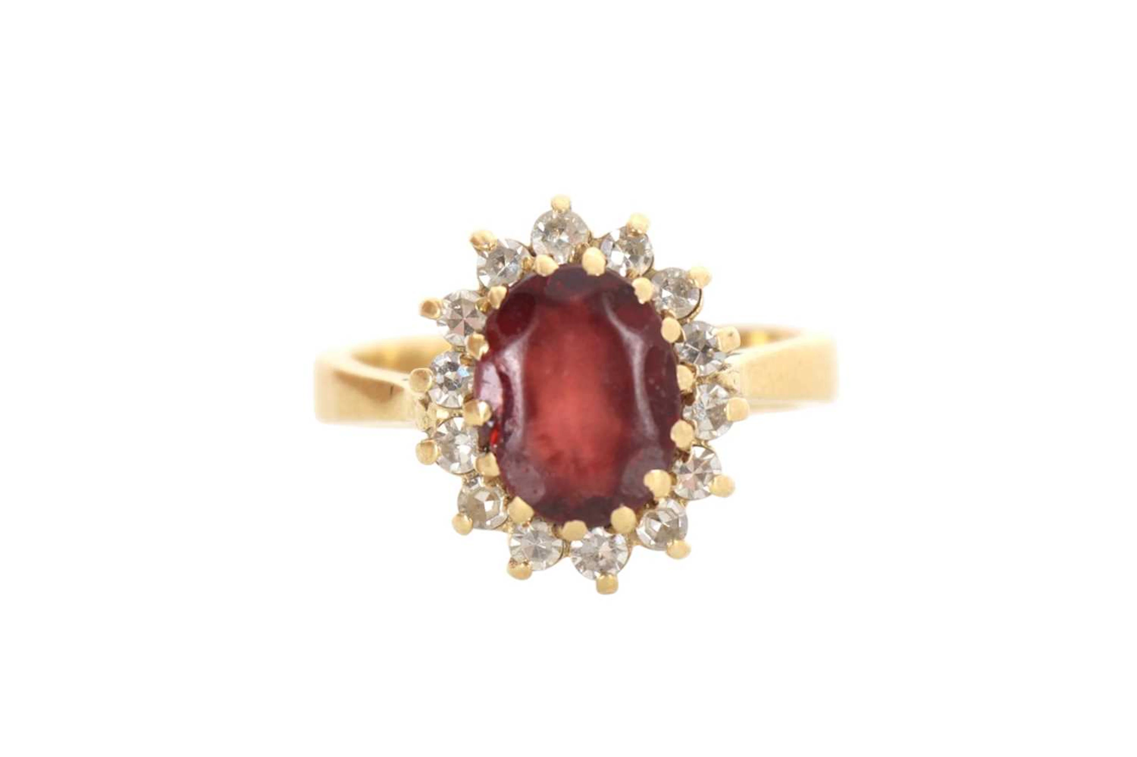 GARNET AND DIAMOND CLUSTER RING LATE 20TH CENTURY