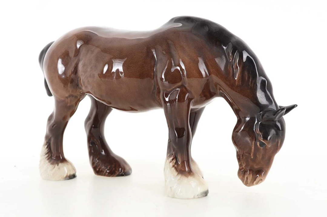 BESWICK MODEL OF A GRAZING SHIRE HORSE, LATE 20TH CENTURY AND THREE OTHERS