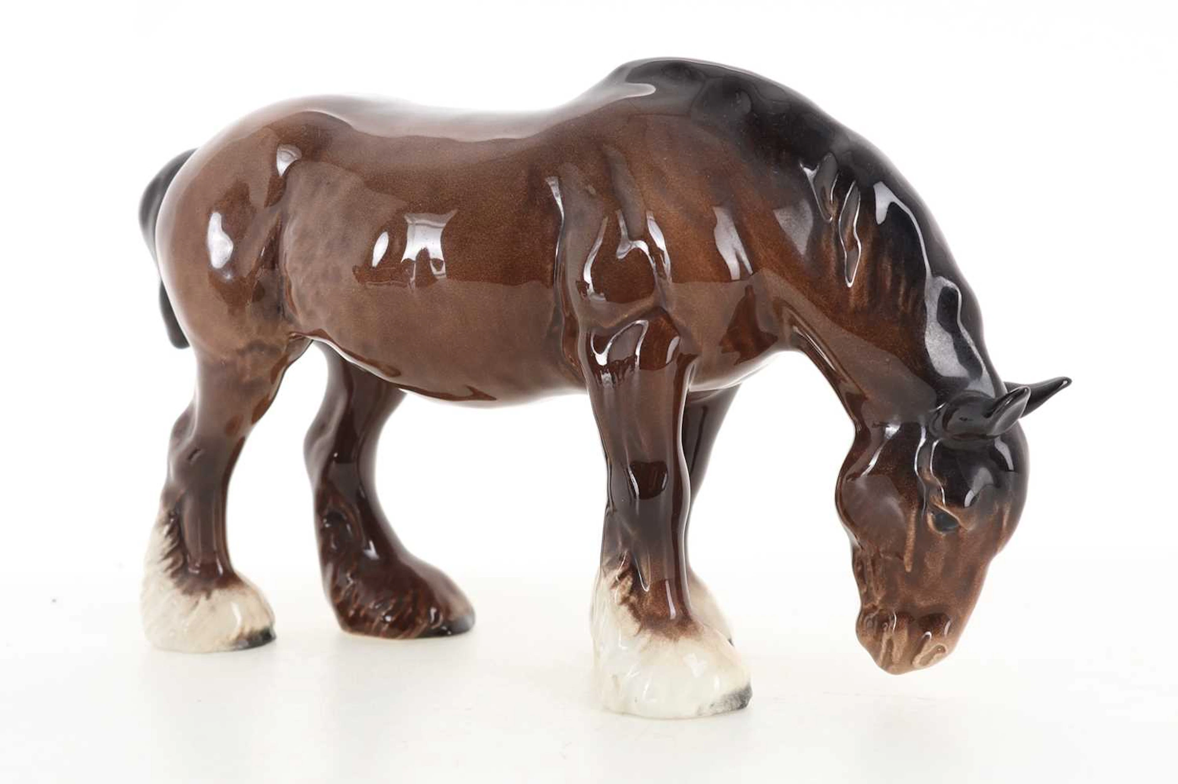 BESWICK MODEL OF A GRAZING SHIRE HORSE, LATE 20TH CENTURY AND THREE OTHERS