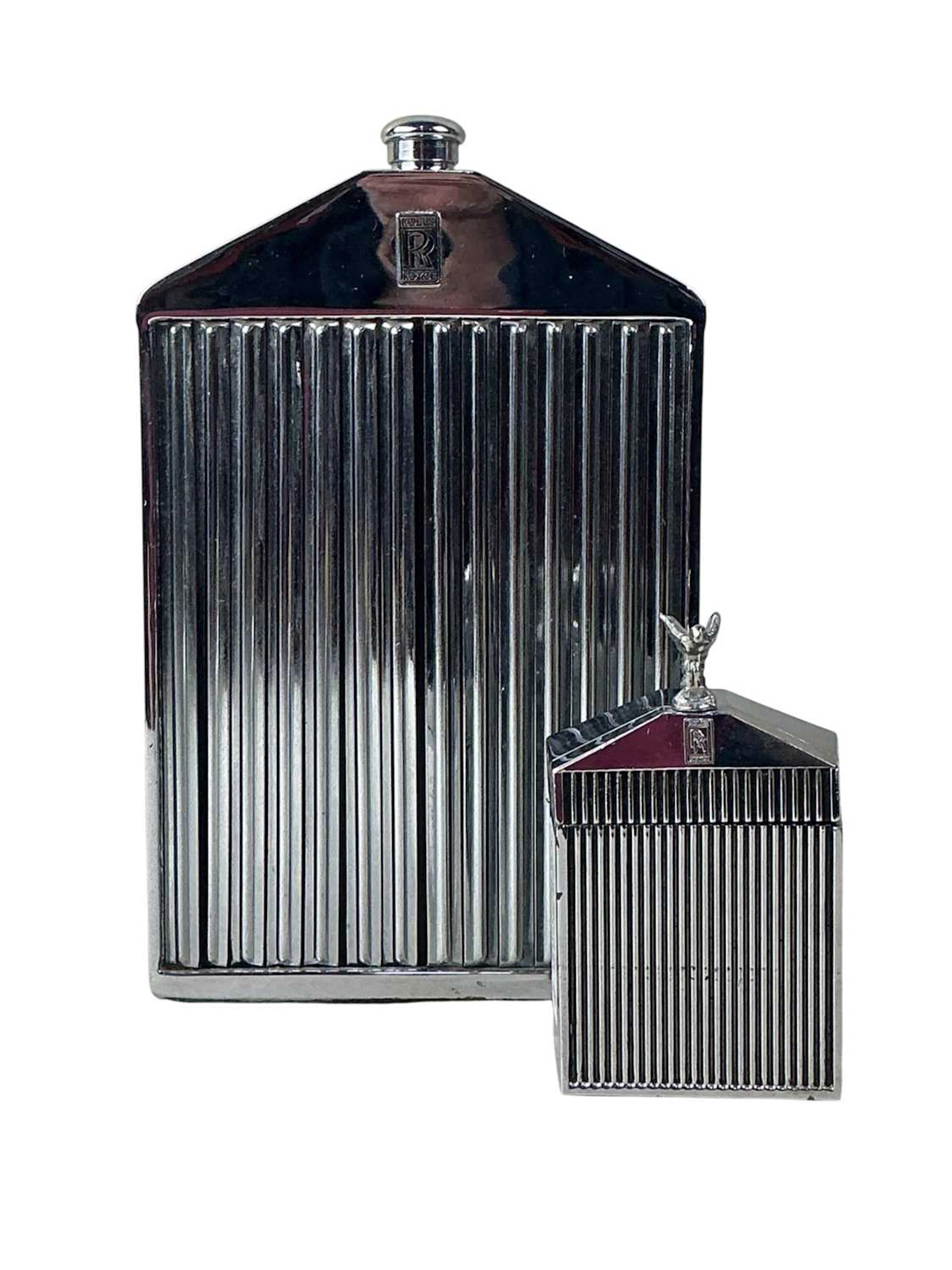 NOVELTY DECANTER, LATE 20TH CENTURY AND A LIGHTER