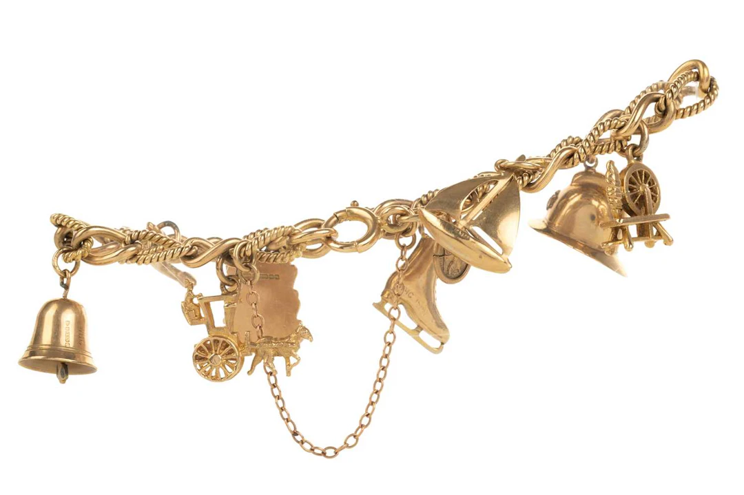 GOLD CHARM BRACELET MID 20TH CENTURY