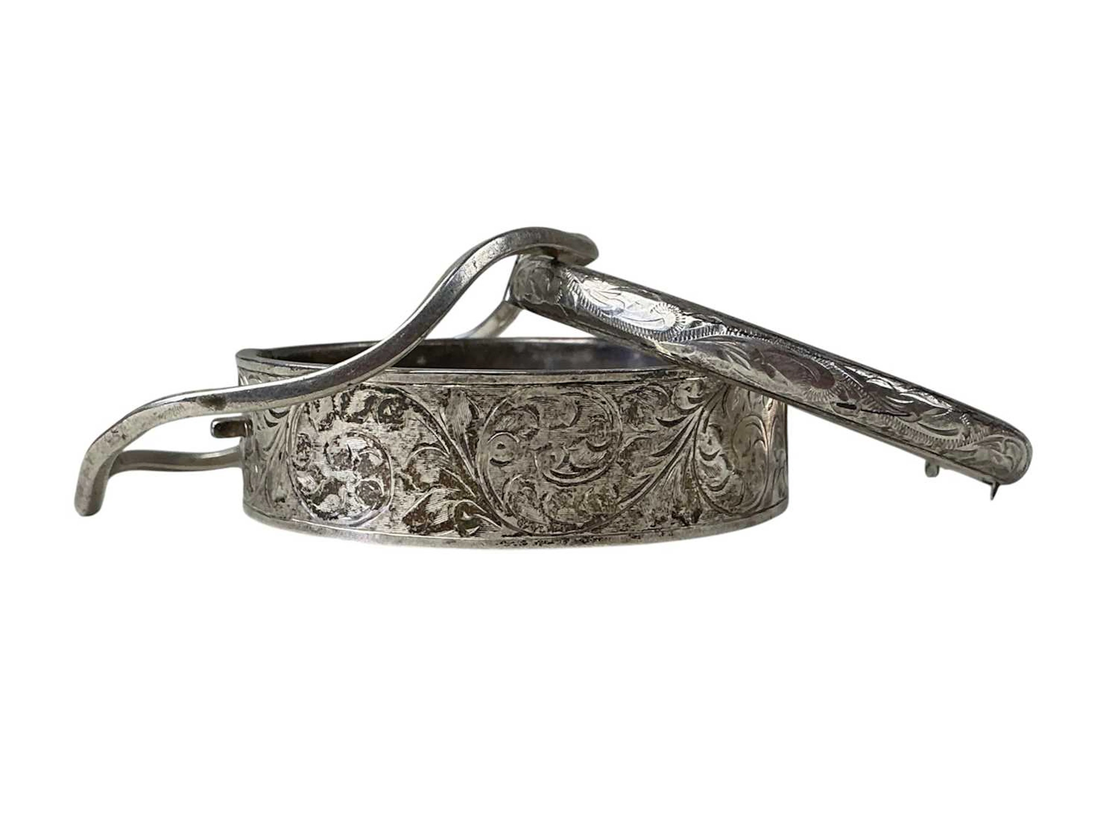 THREE SILVER BANGLES LATE 19TH/EARLY 20TH CENTURY AND LATER