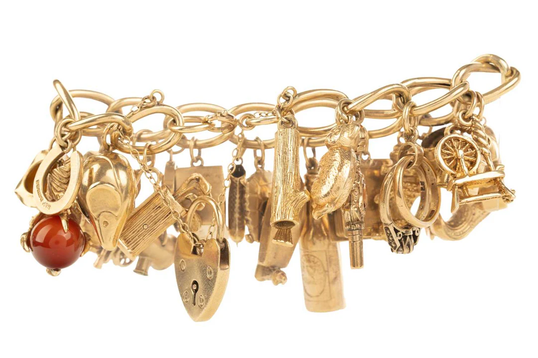 GOLD CHARM BRACELET MID/LATE 20TH CENTURY