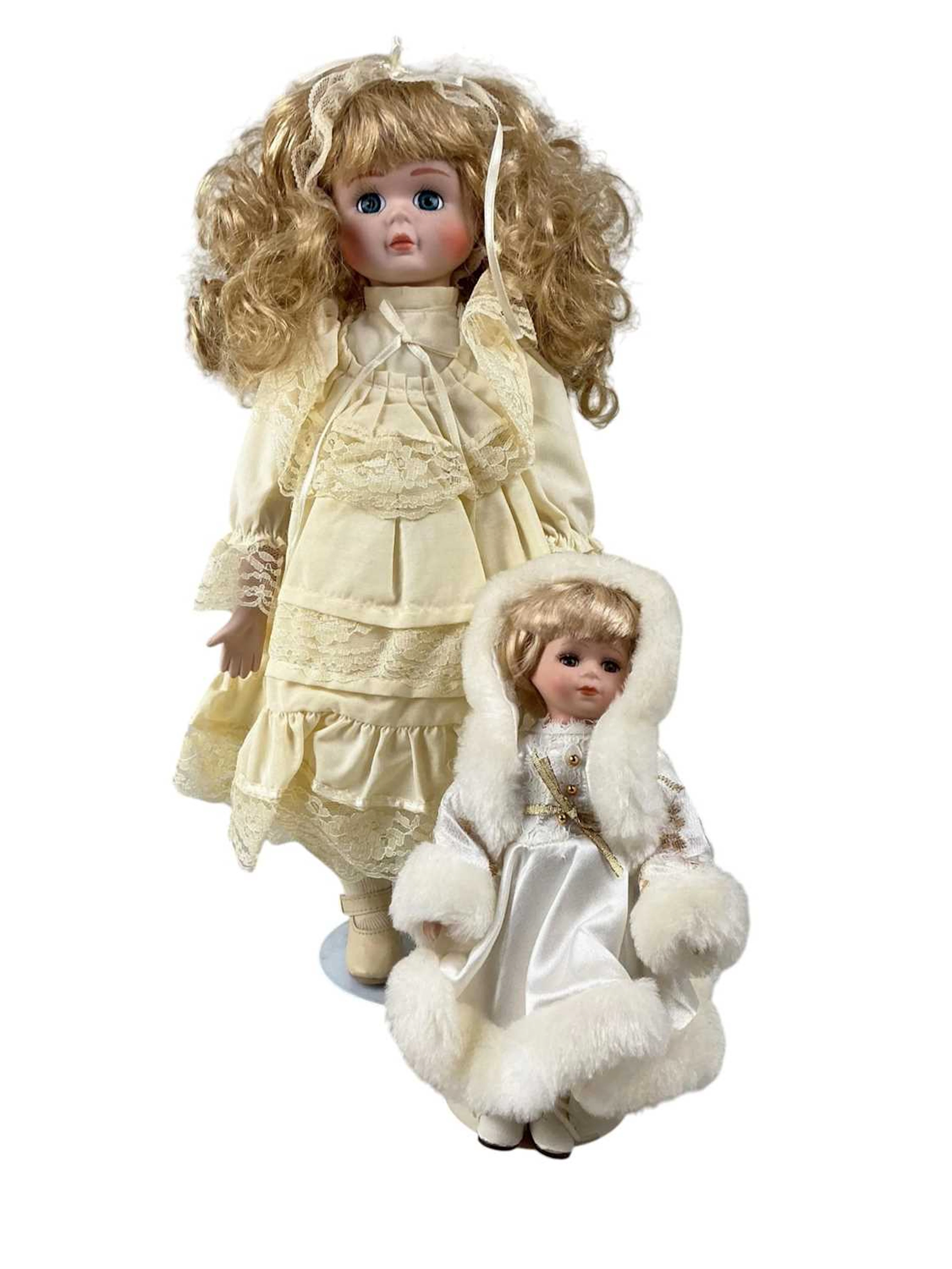 GROUP OF BISQUE HEADED DOLLS LATE 20TH CENTURY
