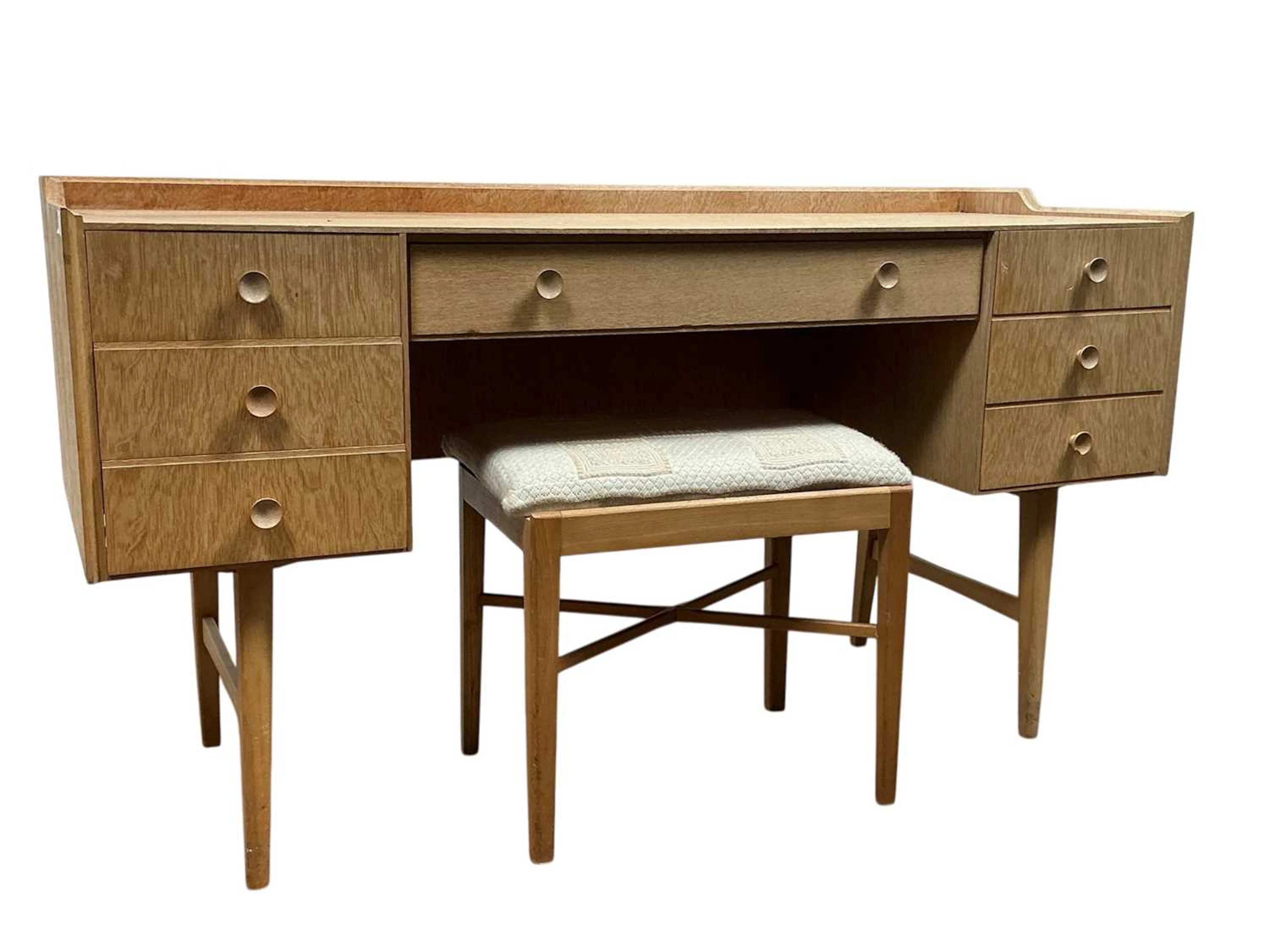 MEREDEW LIGHT TEAK DRESSER, MID 20TH CENTURY AND A MATCHING STOOL