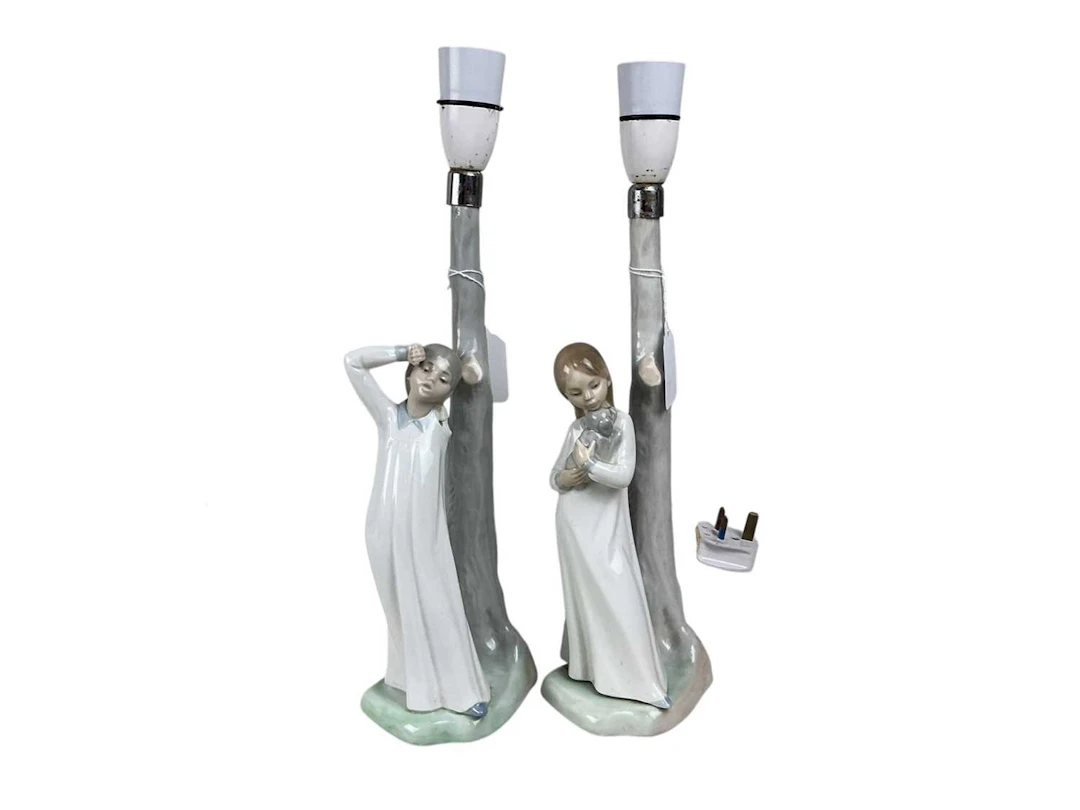 TWO NAO FIGURAL TABLE LAMPS, LATE 20TH CENTURY AND A SET OF BINOCULARS