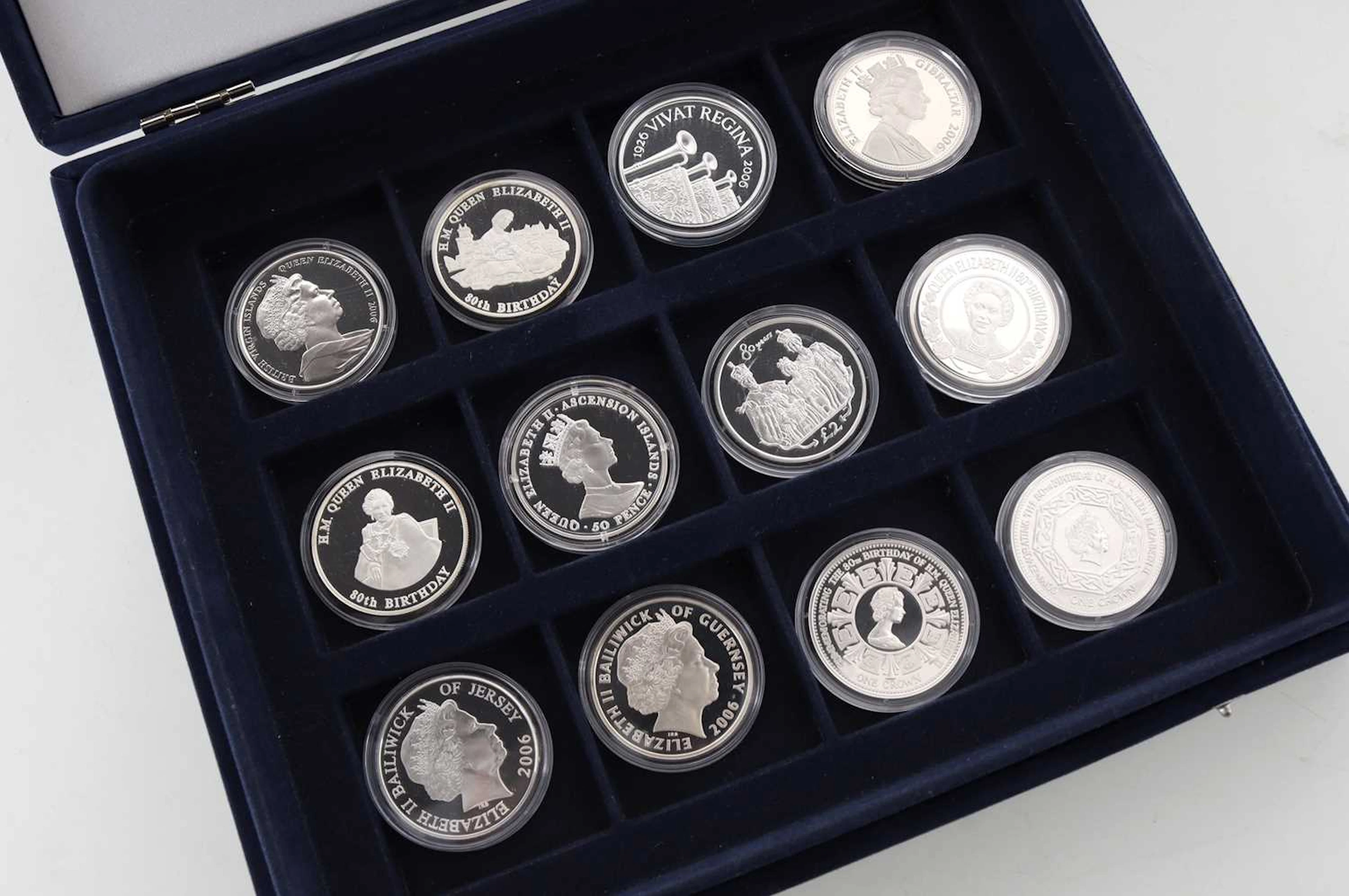 COLLECTION OF SIXTEEN SILVER COMMONWEALTH COMMEMORATIVE COINS 2006