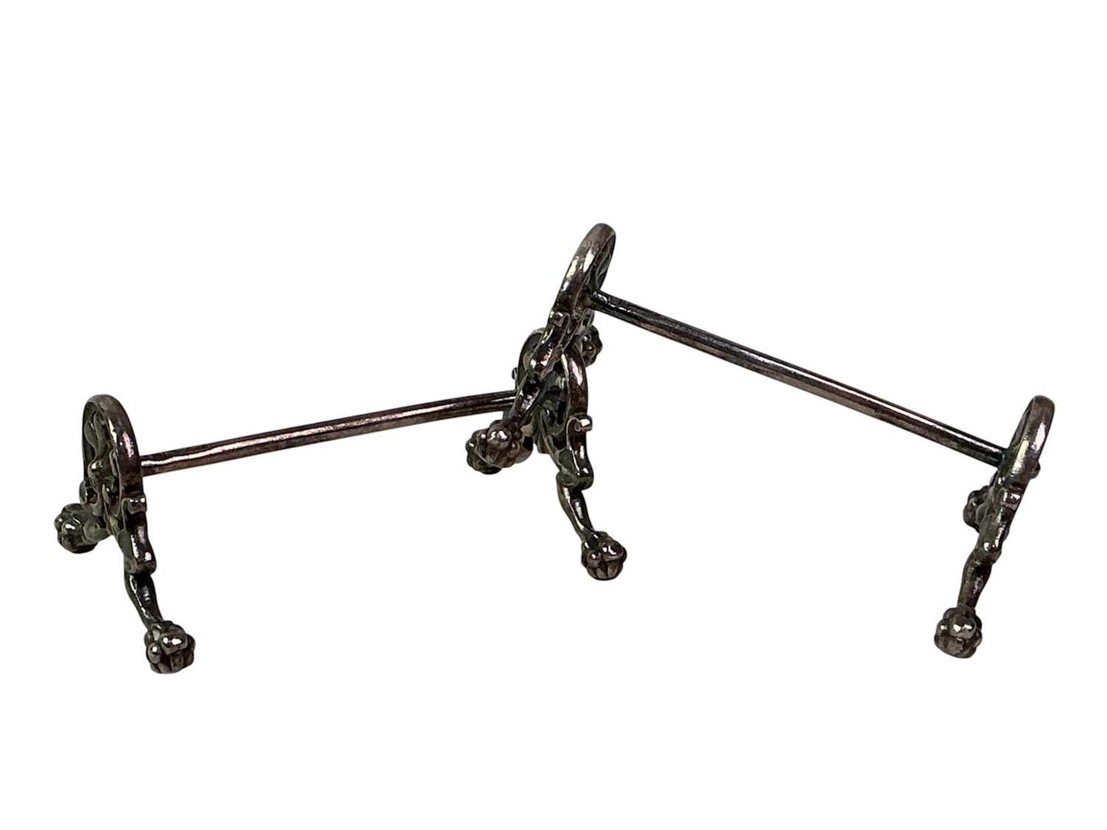 SET OF SIX SILVER PLATED KNIFE RESTS BY CHRISTOFLE ALONG WITH A GROUP