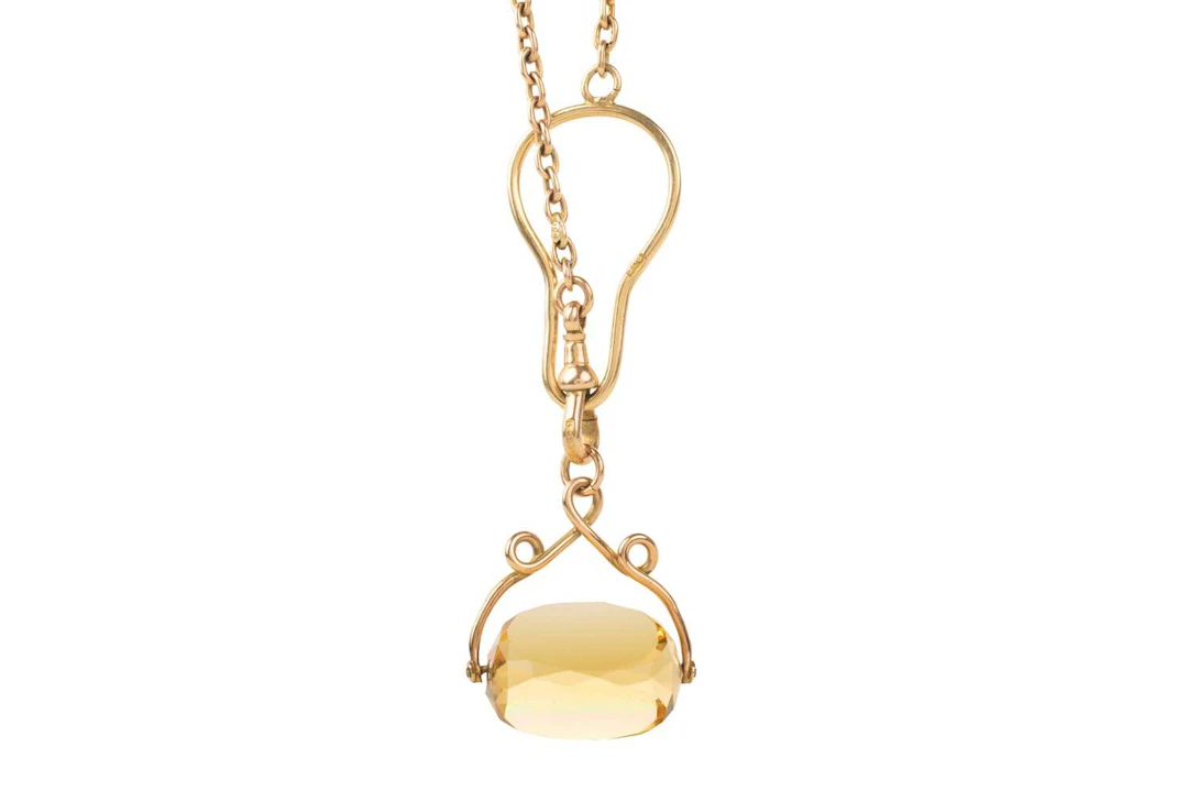 NINE CARAT GOLD WATCH CHAIN AND SWIVEL FOB EARLY 20TH CENTURY