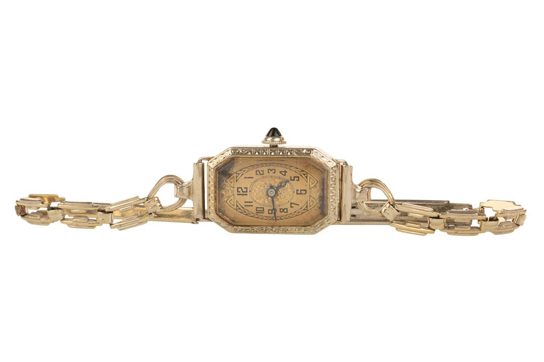 ART DECO FOURTEEN CARAT GOLD CASED MANUAL WIND WRIST WATCH MID 20TH CENTURY