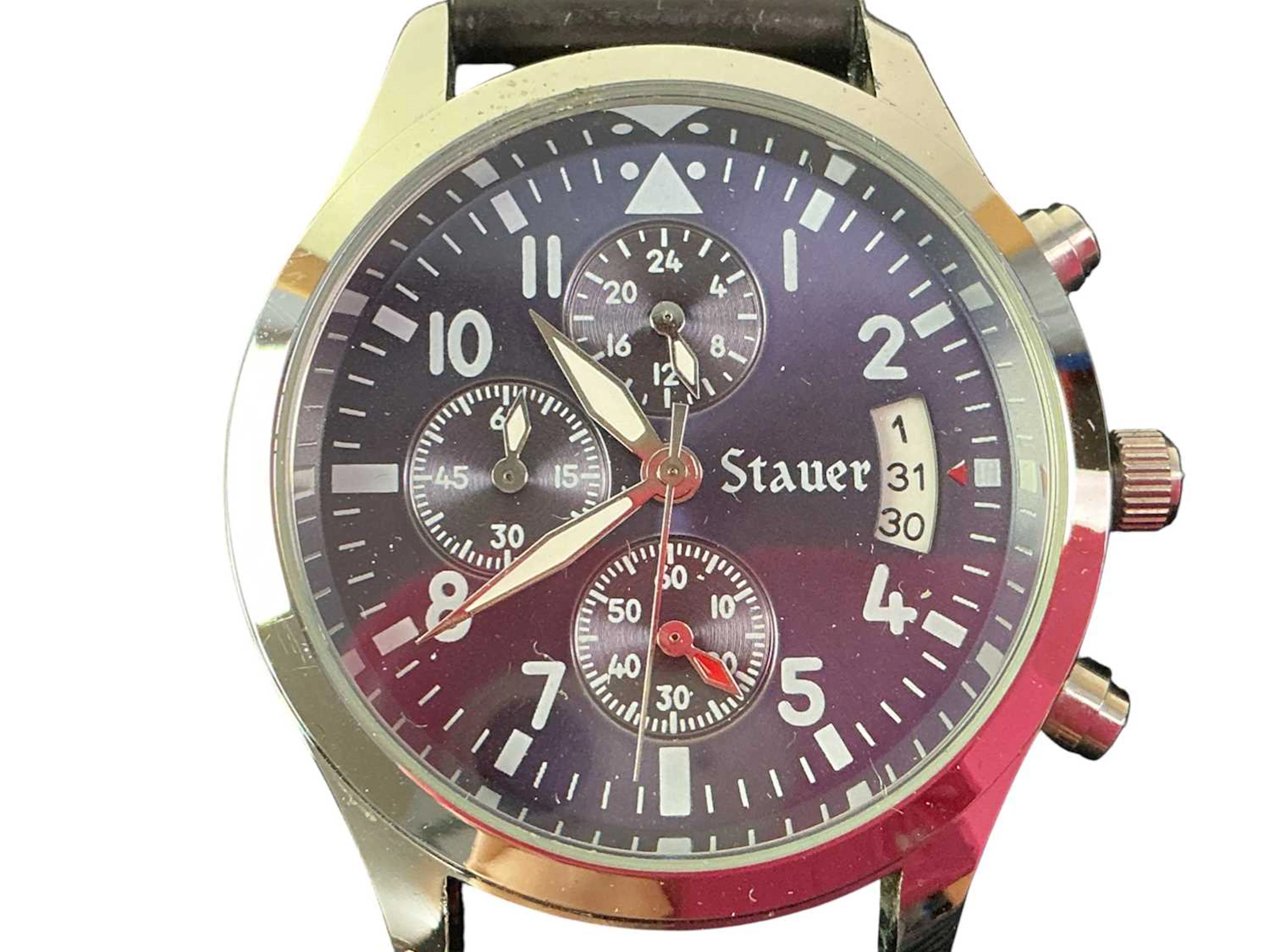 BOSS, STAUER, ROTARY AND OTHERS ELEVEN WRIST WATCHES