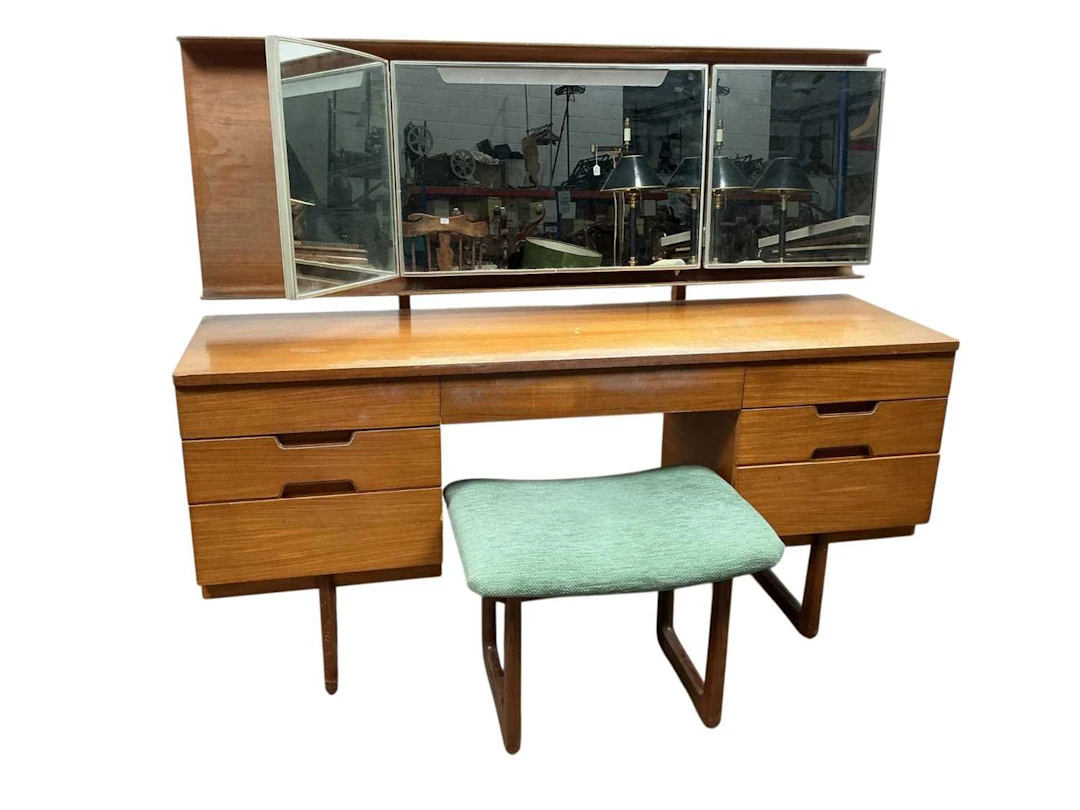 TEAK KNEEHOLE DRESSING TABLE AND STOOL MID 20TH CENTURY