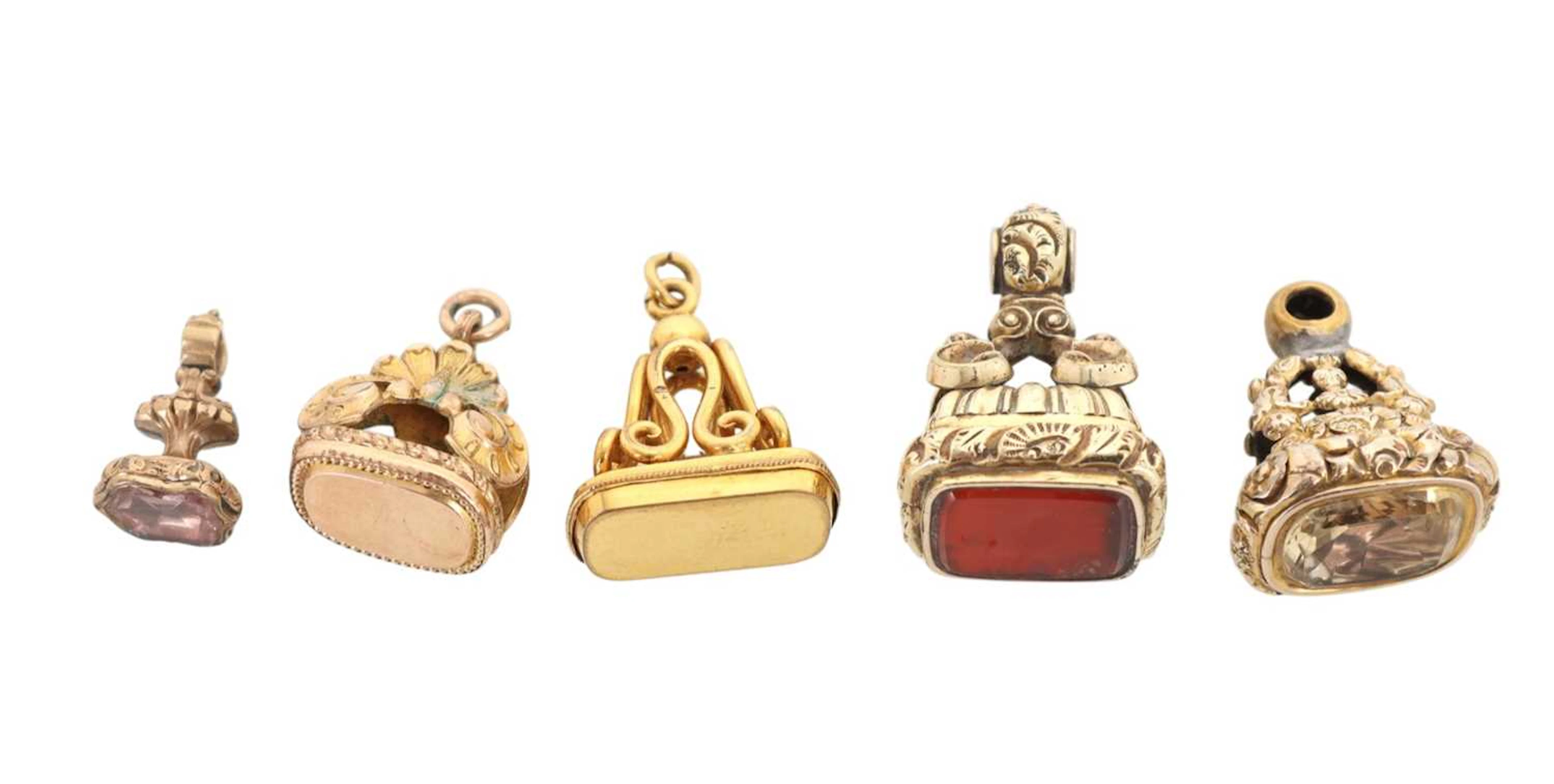 FIVE YELLOW METAL SEAL FOBS EARLY 19TH CENTURY