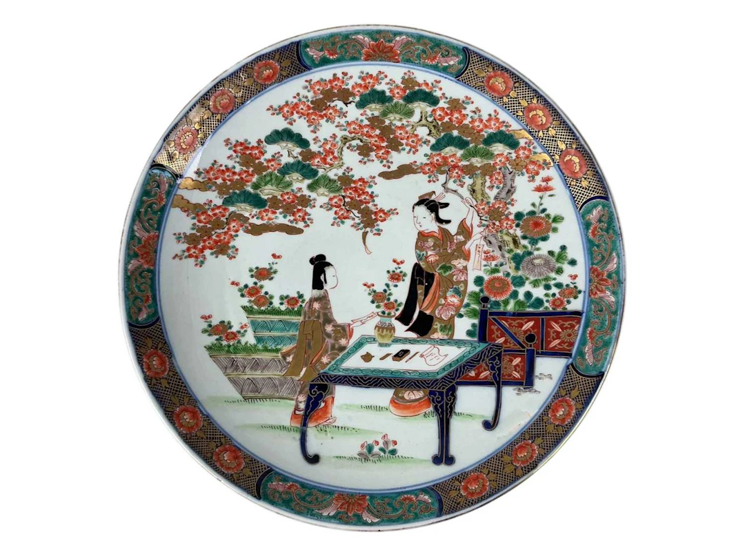 JAPANESE CIRCULAR WALL PLATE, EARLY 20TH CENTURY AND A JAPANESE DISH