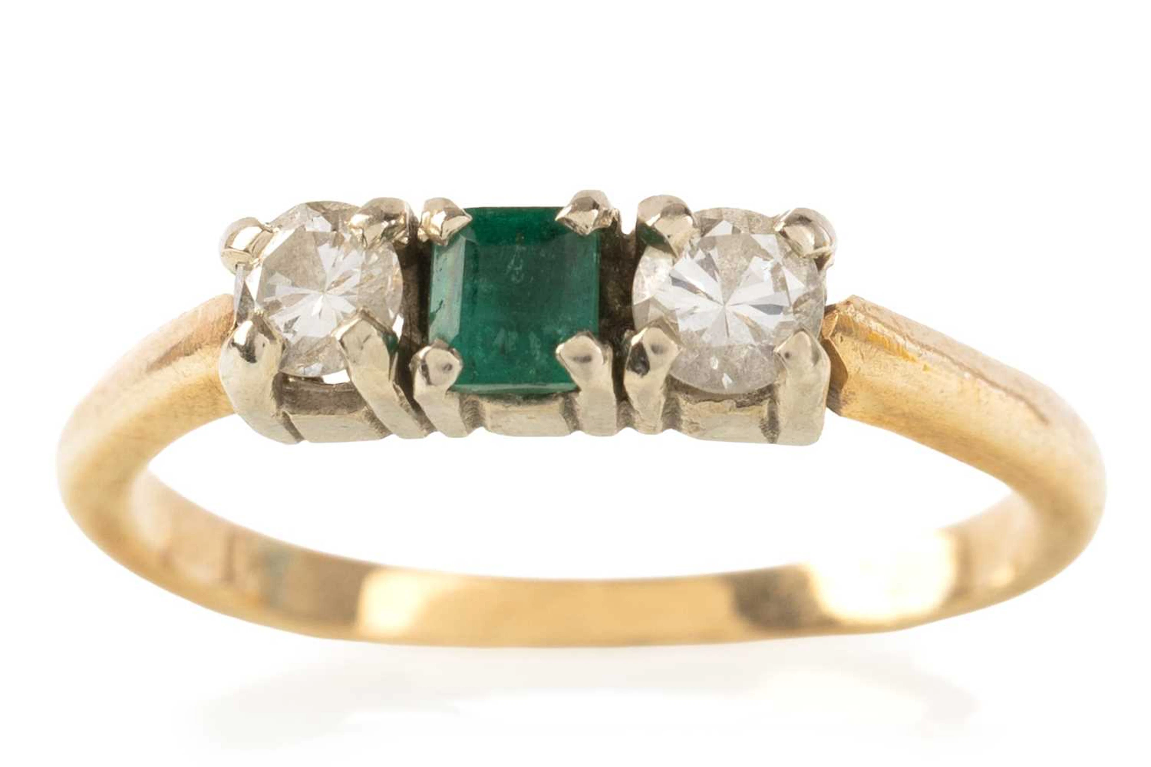 EMERALD AND DIAMOND THREE STONE RING MID/LATE 20TH CENTURY