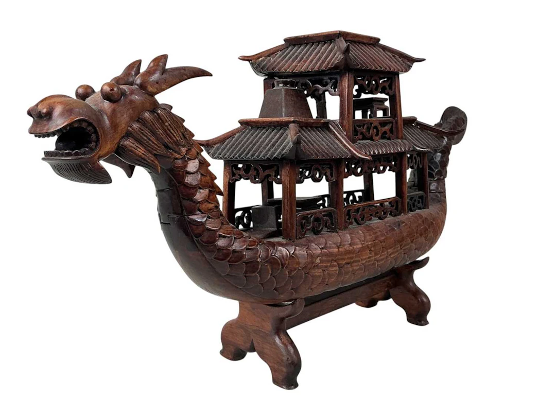 CHINESE HARDWOOD BOAT, EARLY/MID 20TH CENTURY AND TWO CHINESE MASKS