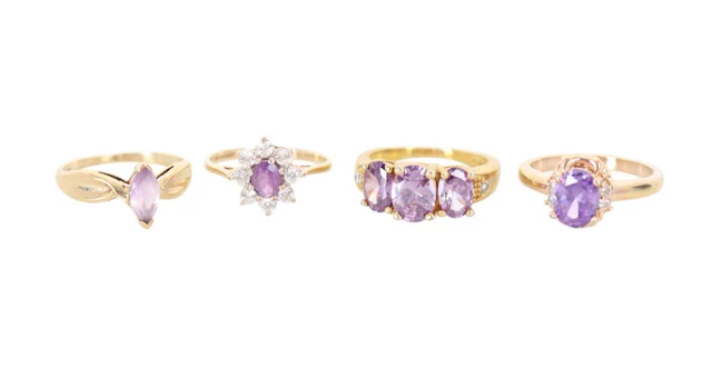 FOUR GEM SET RINGS LATE 20TH CENTURY