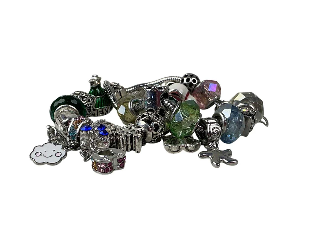 TWO CHARM BRACELETS LATE 20TH CENTURY