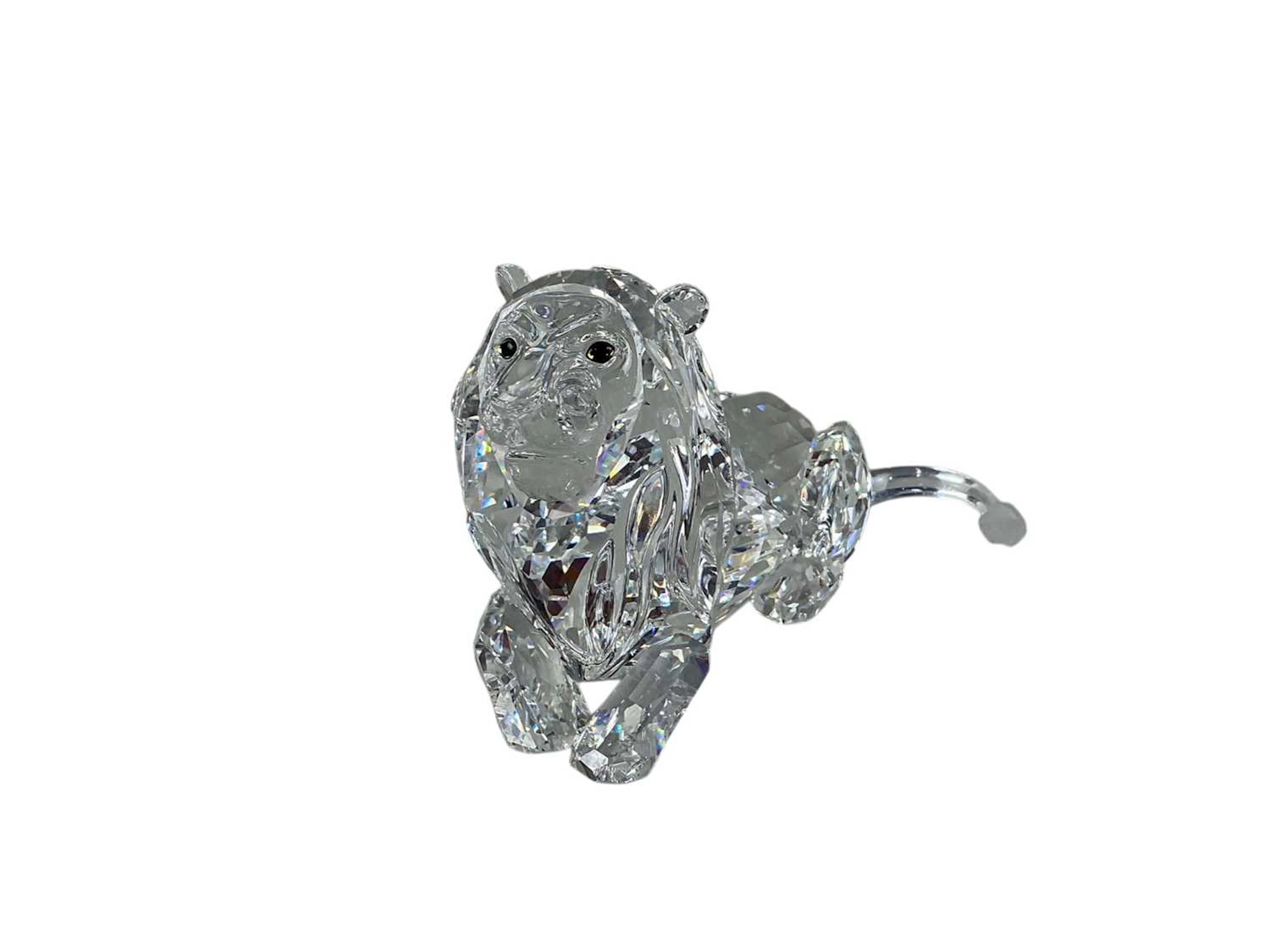 SWAROVSKI CRYSTAL FIGURE OF A RECUMBENT LION LATE 20TH CENTURY