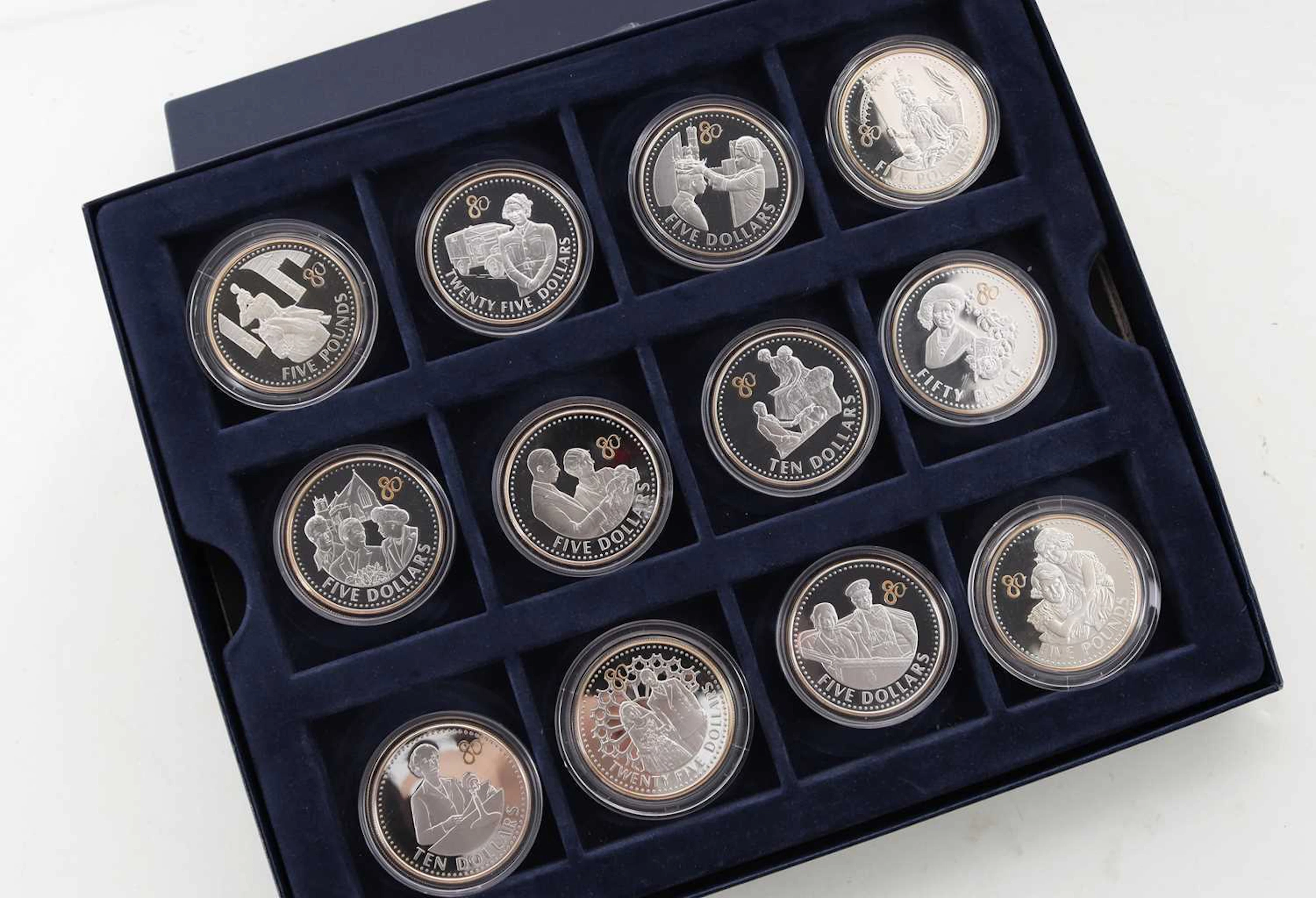COLLECTION OF TWELVE SILVER COMMONWEALTH COMMEMORATIVE COINS 2006