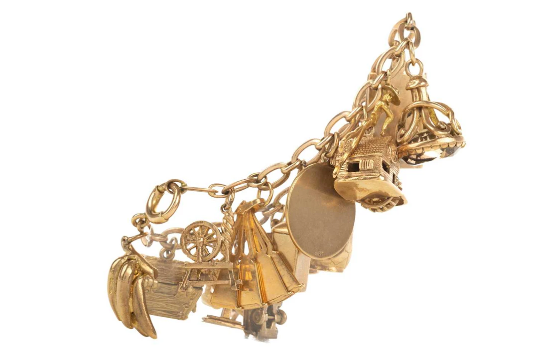 GOLD CHARM BRACELET MID/LATE 20TH CENTURY