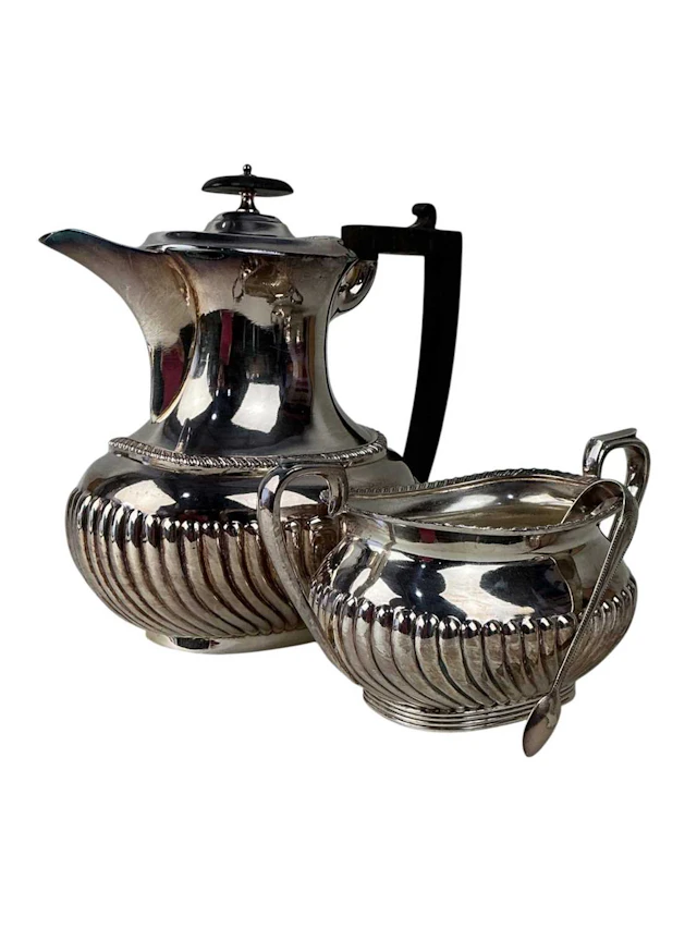 SILVER PLATED FOUR PIECE TEA AND COFFEE SERVICE MID 20TH CENTURY