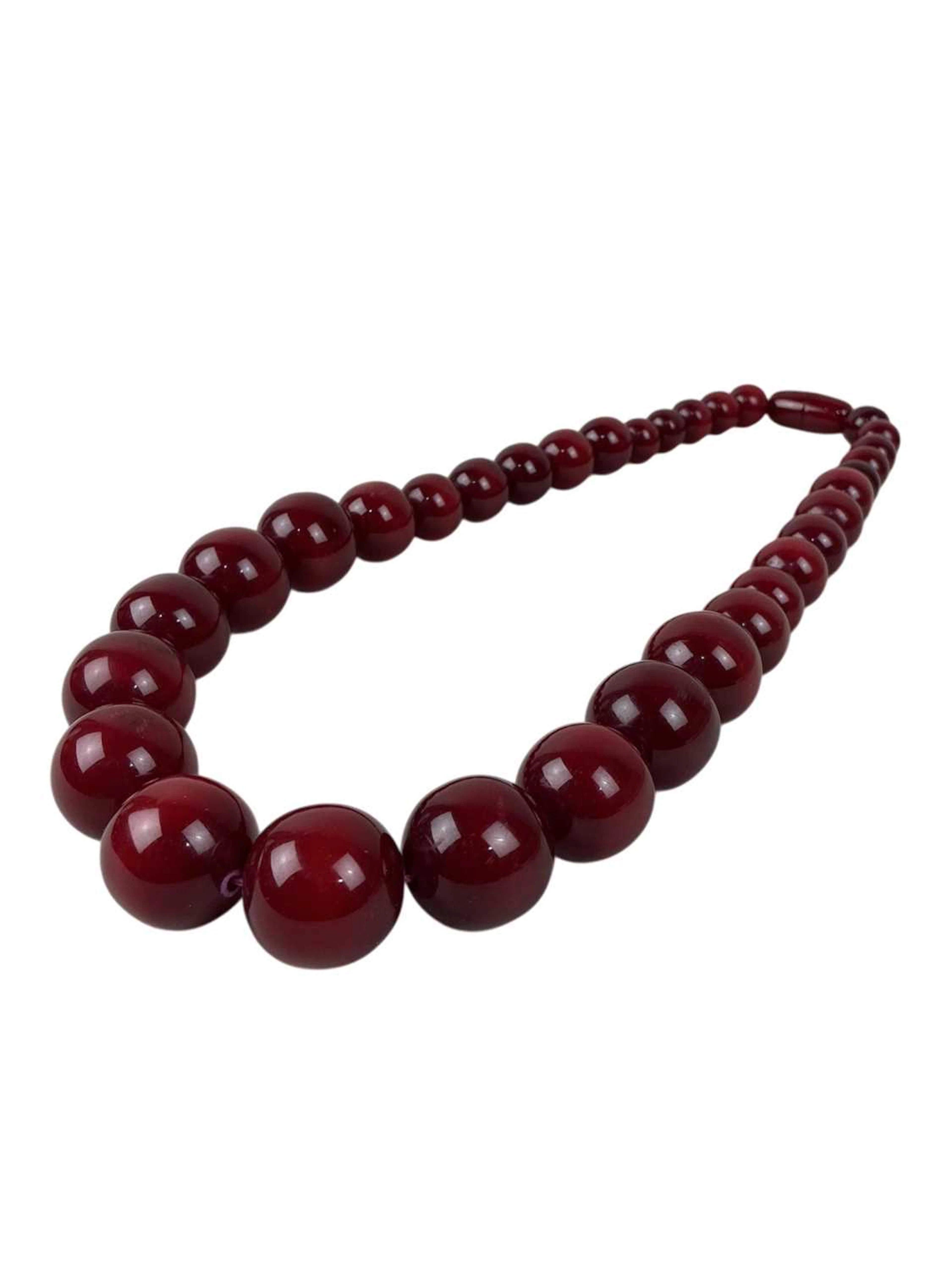 CHERRY AMBER COLOURED BEAD NECKLACE LATE 20TH CENTURY
