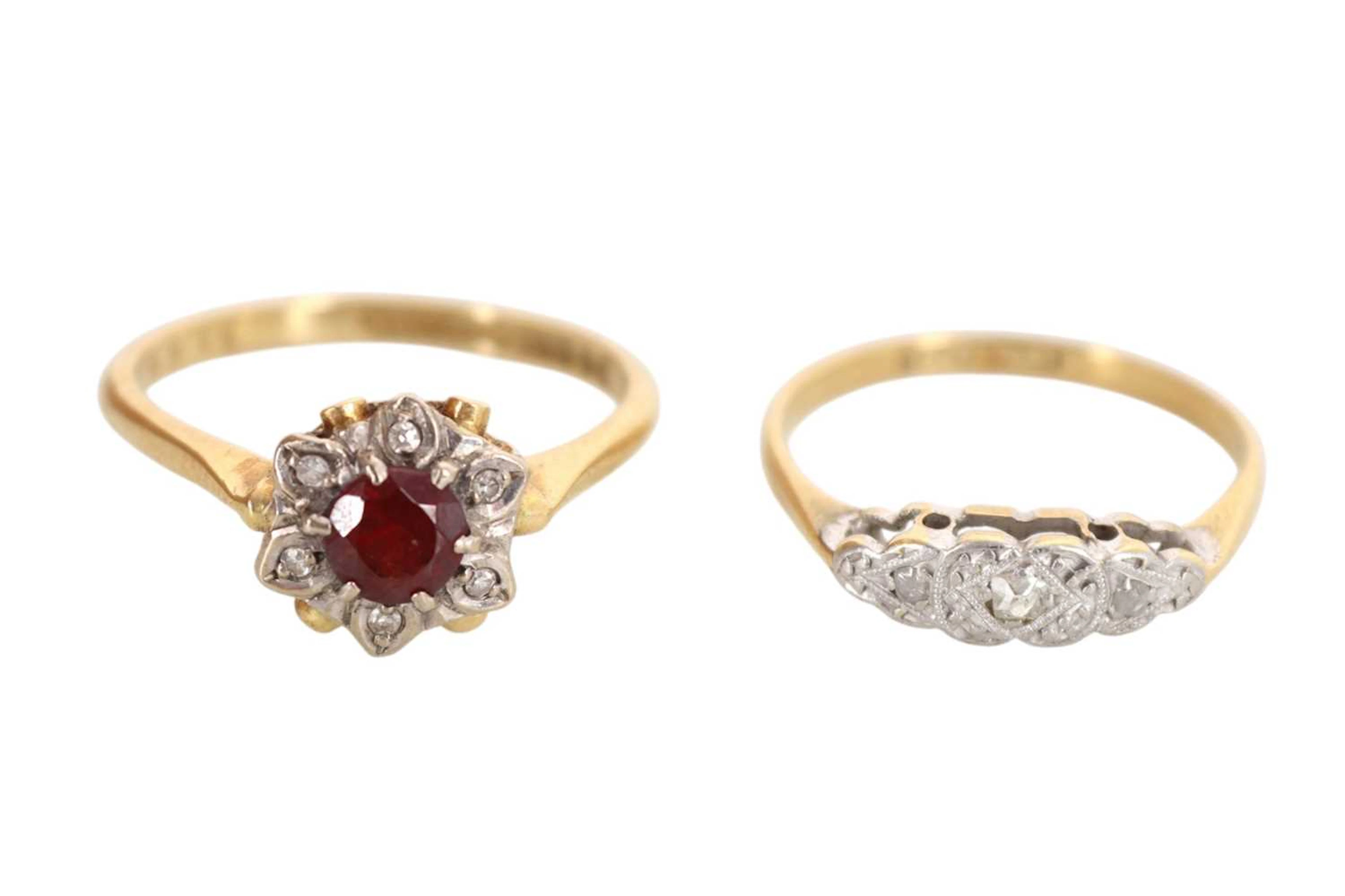 DIAMOND THREE STONE RING AND A CLUSTER RING LATE 20TH CENTURY