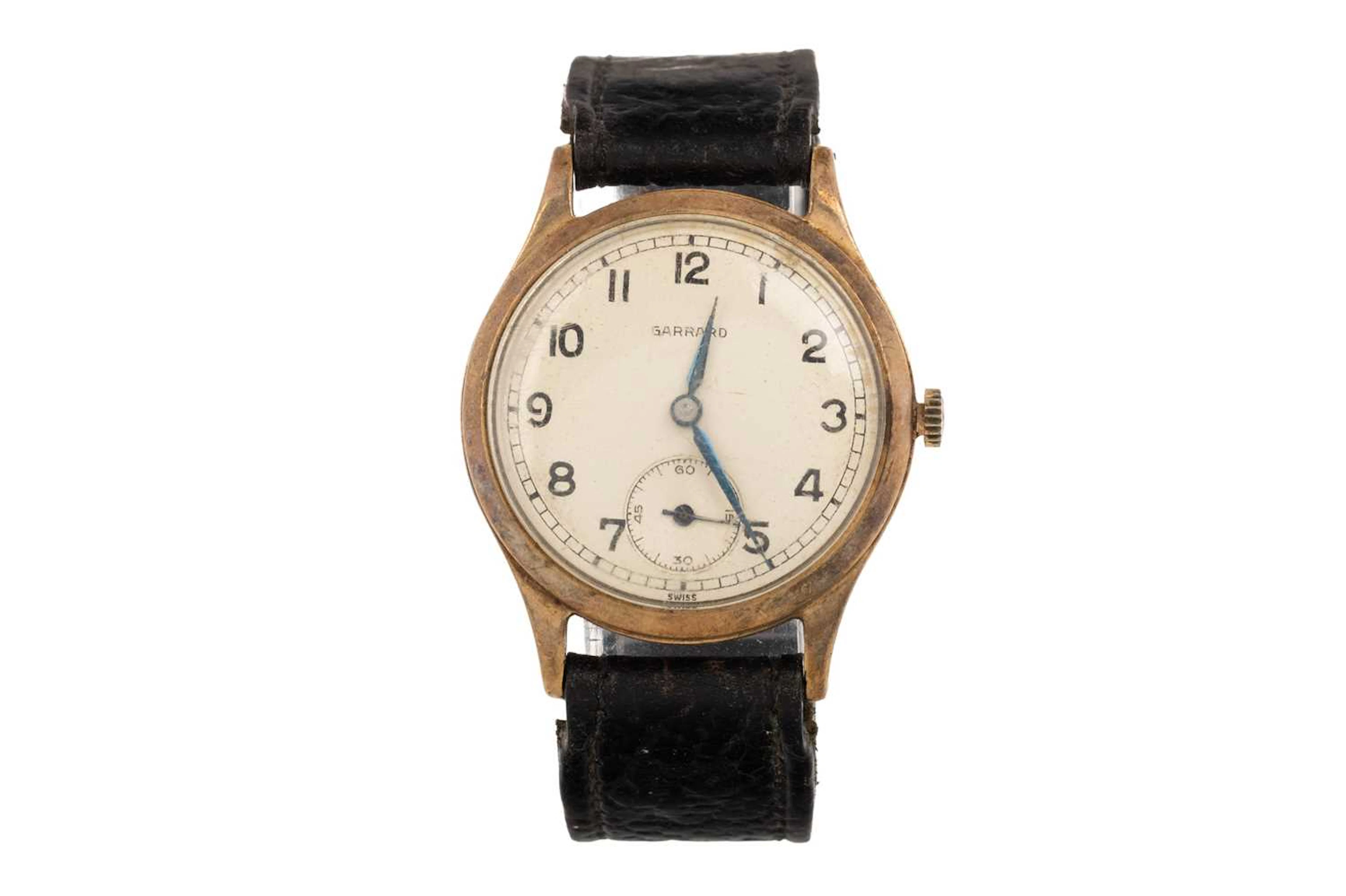 GARRARD NINE CARAT GOLD MANUAL WIND WRIST WATCH