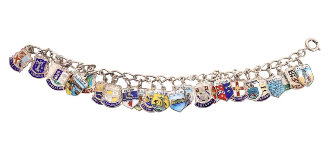 SILVER CHARM BRACELET MID 20TH CENTURY