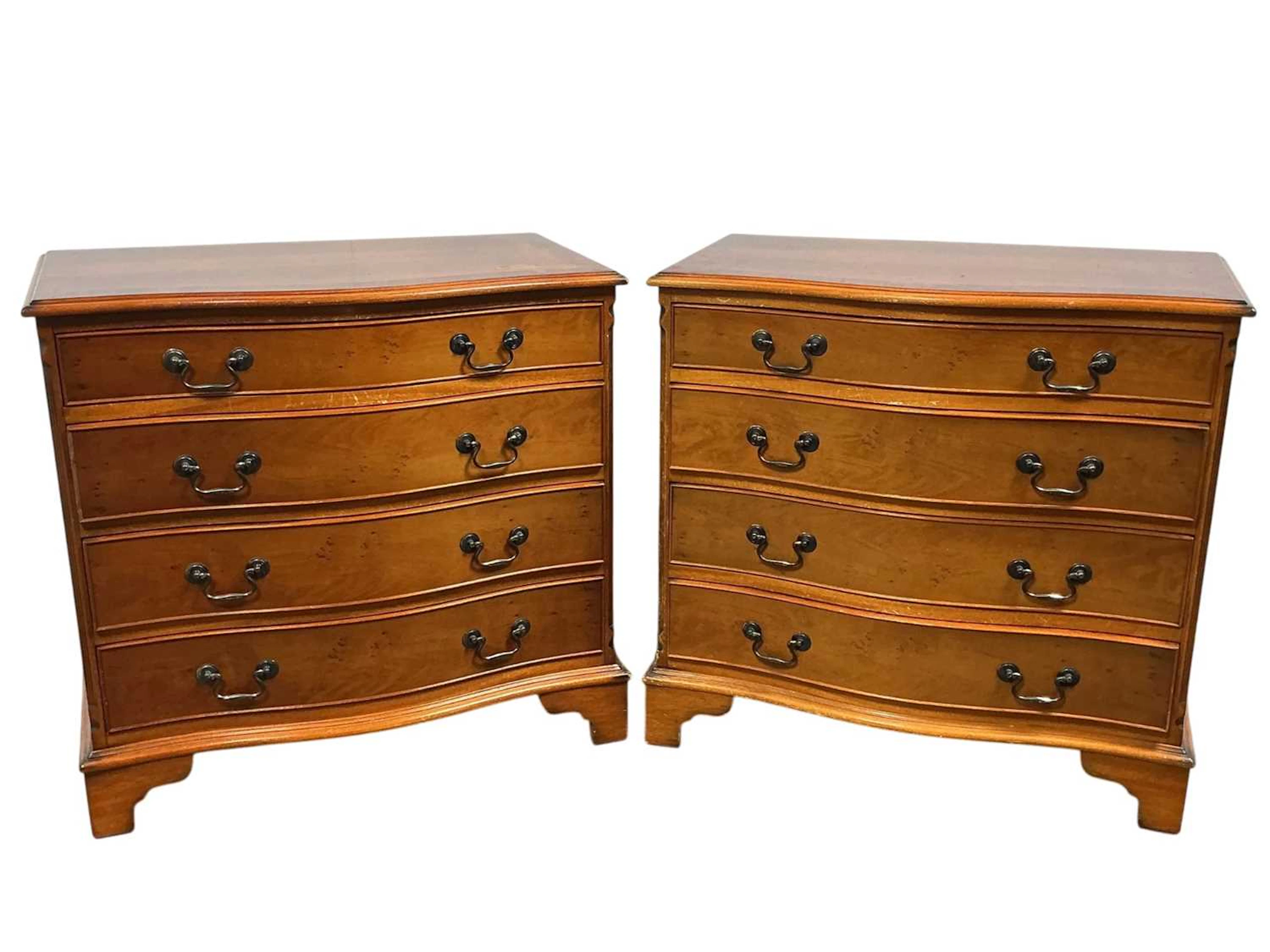 PAIR OF REPRODUCTION YEW WOOD SERPENTINE FRONTED CHEST OF DRAWERS