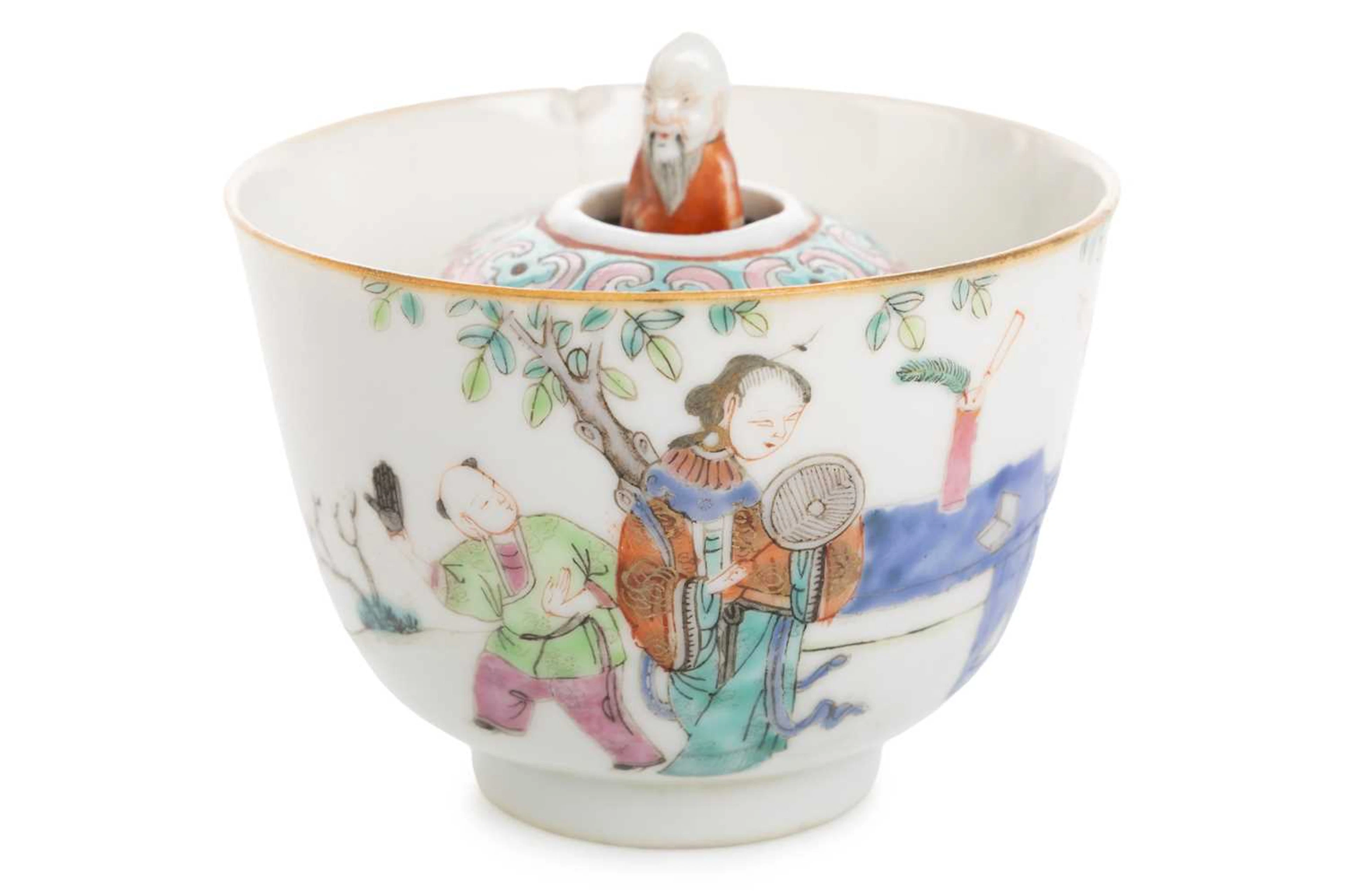 CHINESE FAMILLE ROSE PORCELAIN 'TRICK' CUP LATE 19TH CENTURY