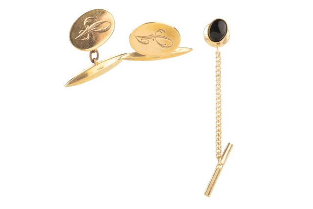 PAIR OF NINE CARAT GOLD CUFFLINKS AND A GOLD PLATED TIE PIN MID 20TH CENTURY