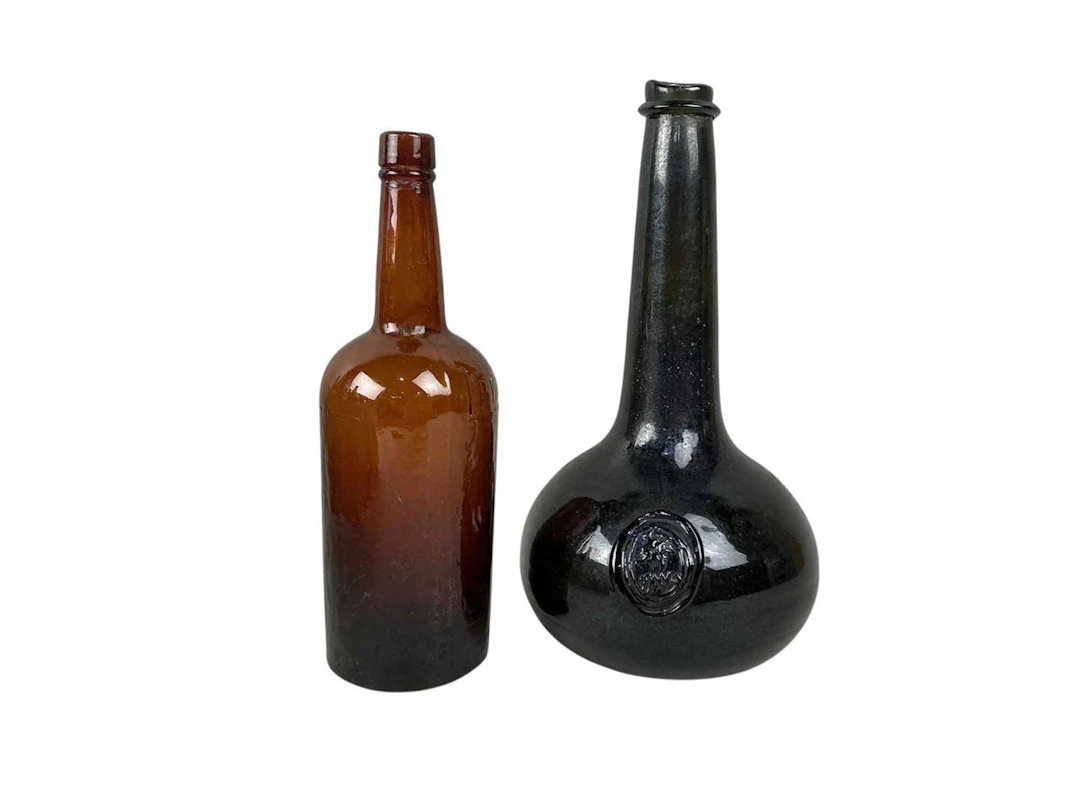 GROUP OF GLASS BOTTLES EARLY 20TH CENTURY